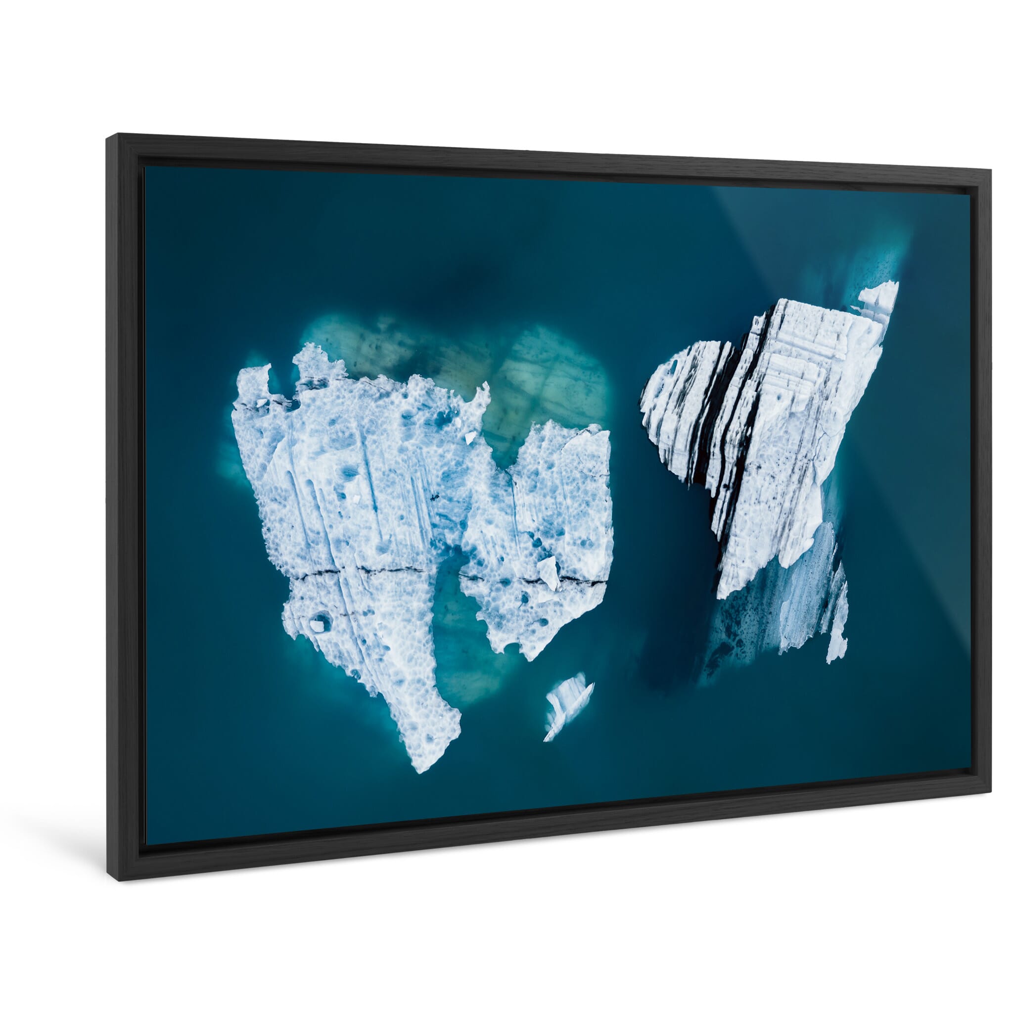Framed photo print of sculptural ice forms with dark volcanic ash layers