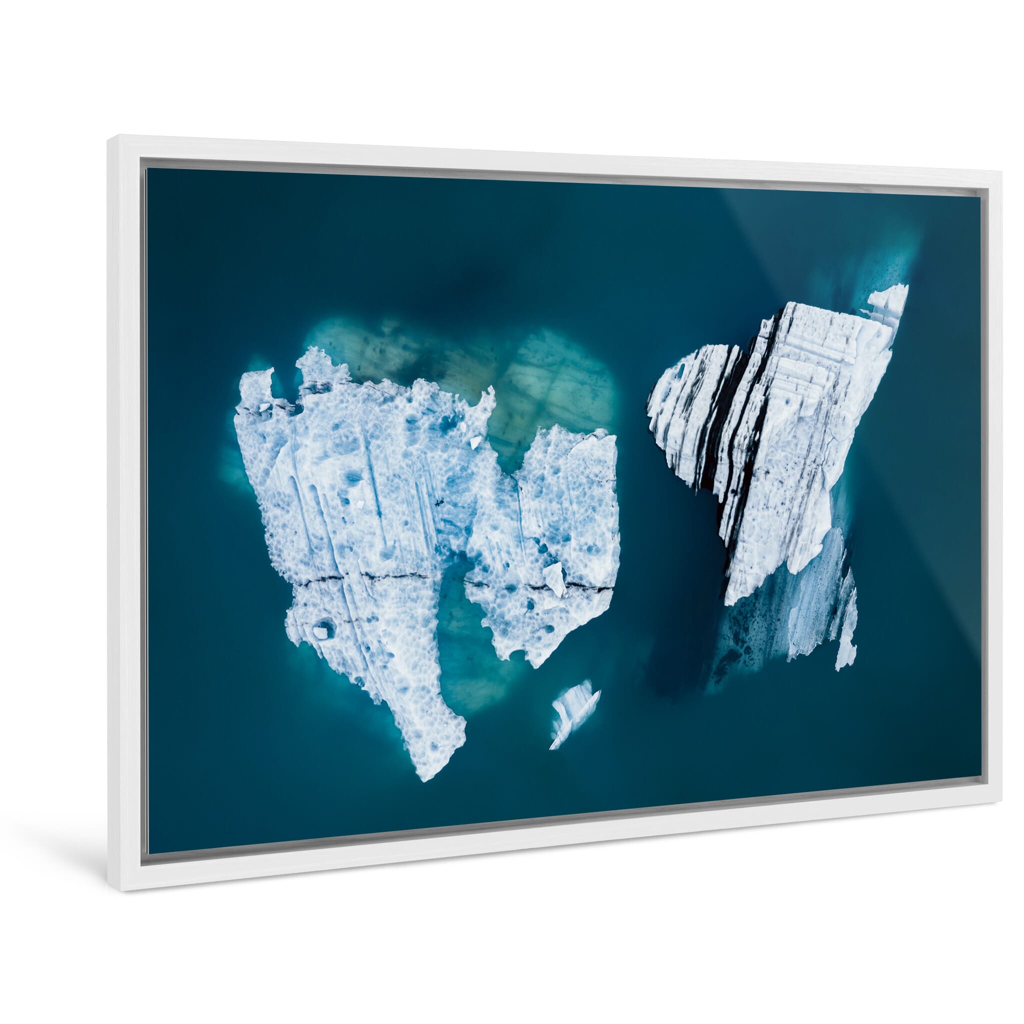 Framed photo print of melting glacier fragments revealing ancient ash lines from above