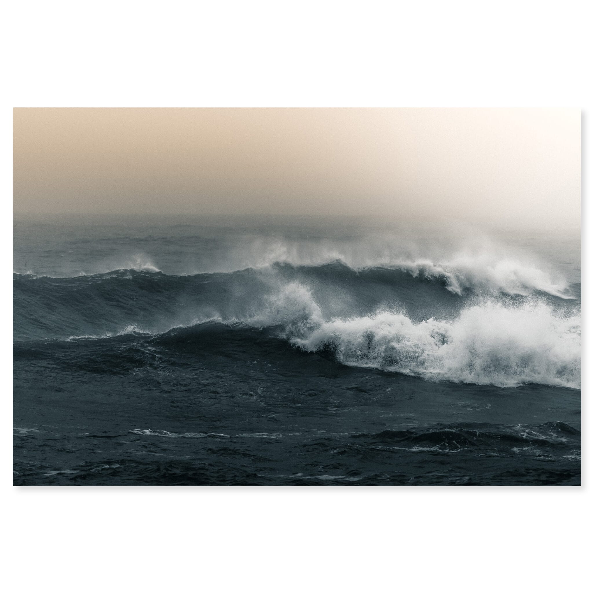 Fine art print of waves on Iceland’s southern coast under soft golden light