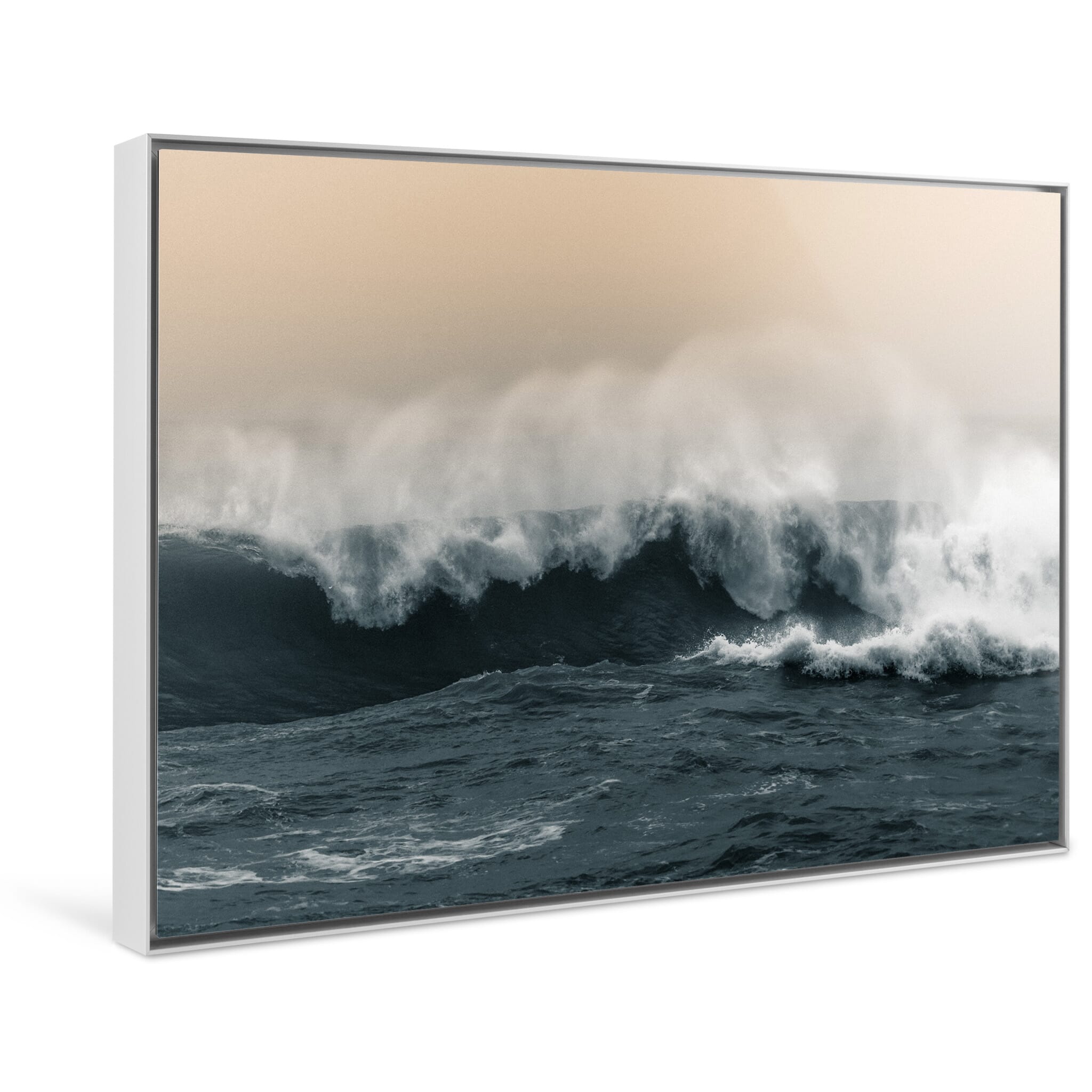 Framed photo print of rolling waves with sunrise glow and coastal mist