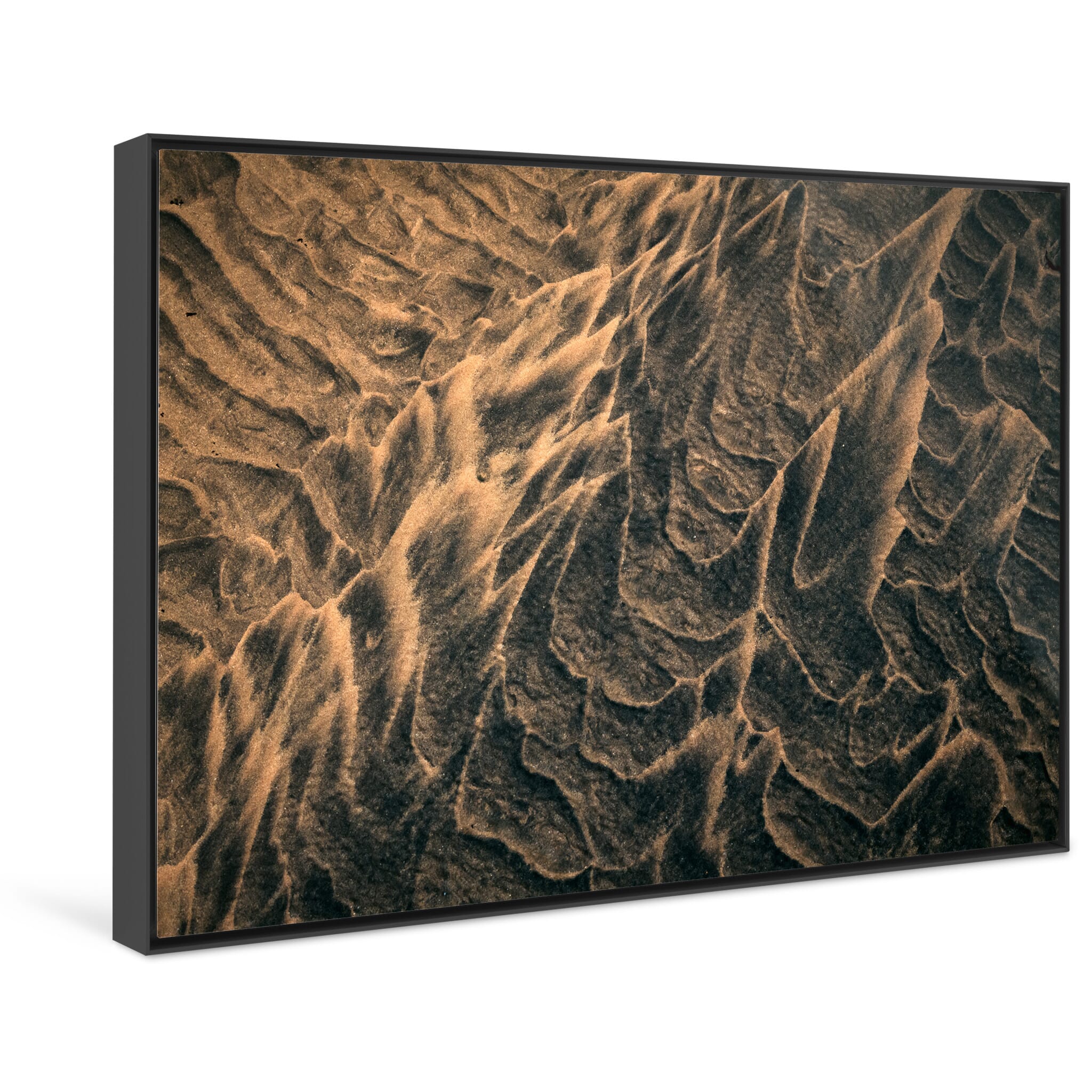 Framed photo print of dark and light sand structures formed by receding water