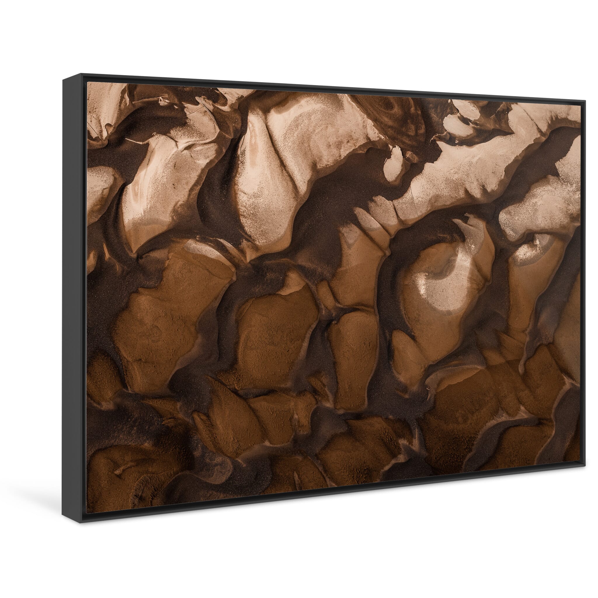 Framed photo print of smooth organic shapes in shifting sand deposits