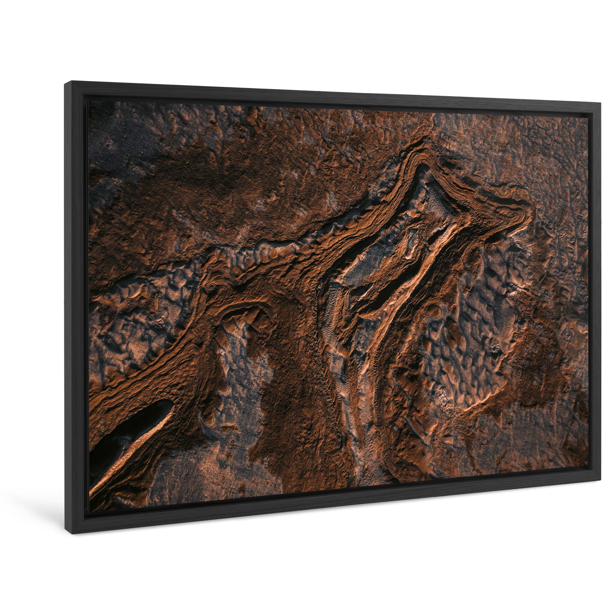 Framed photo print of abstract aerial view showing meltwater-shaped patterns in sand
