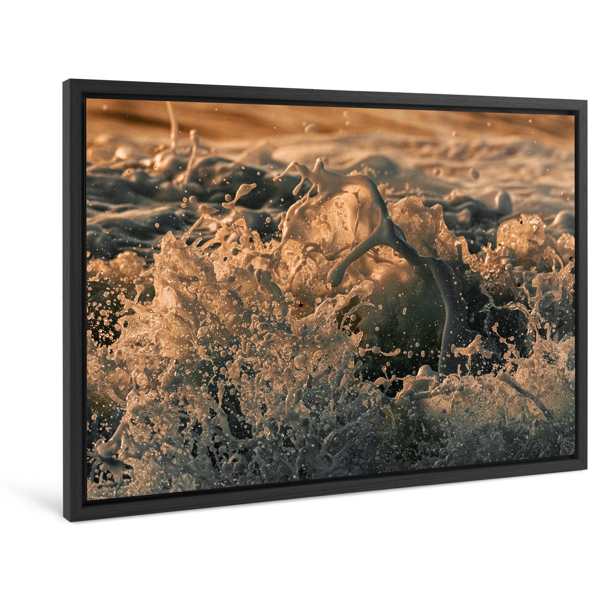 Framed photo print of dynamic waves meeting volcanic sand in winter light