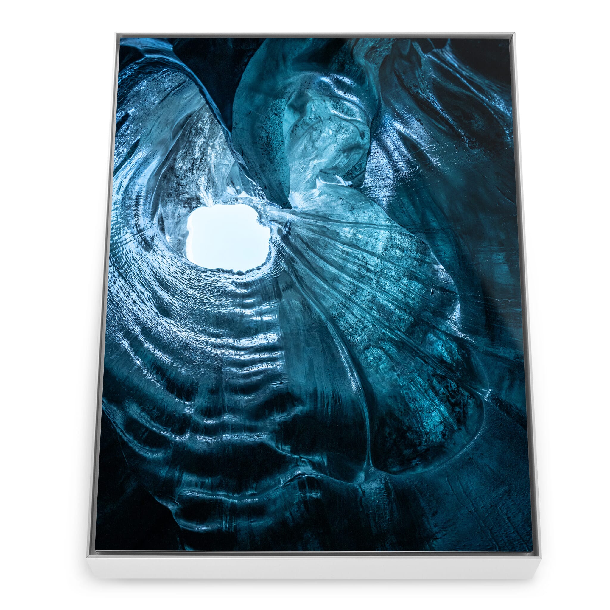 Framed photo print of a glacier ice cave ceiling with translucent blue tones and layered textures