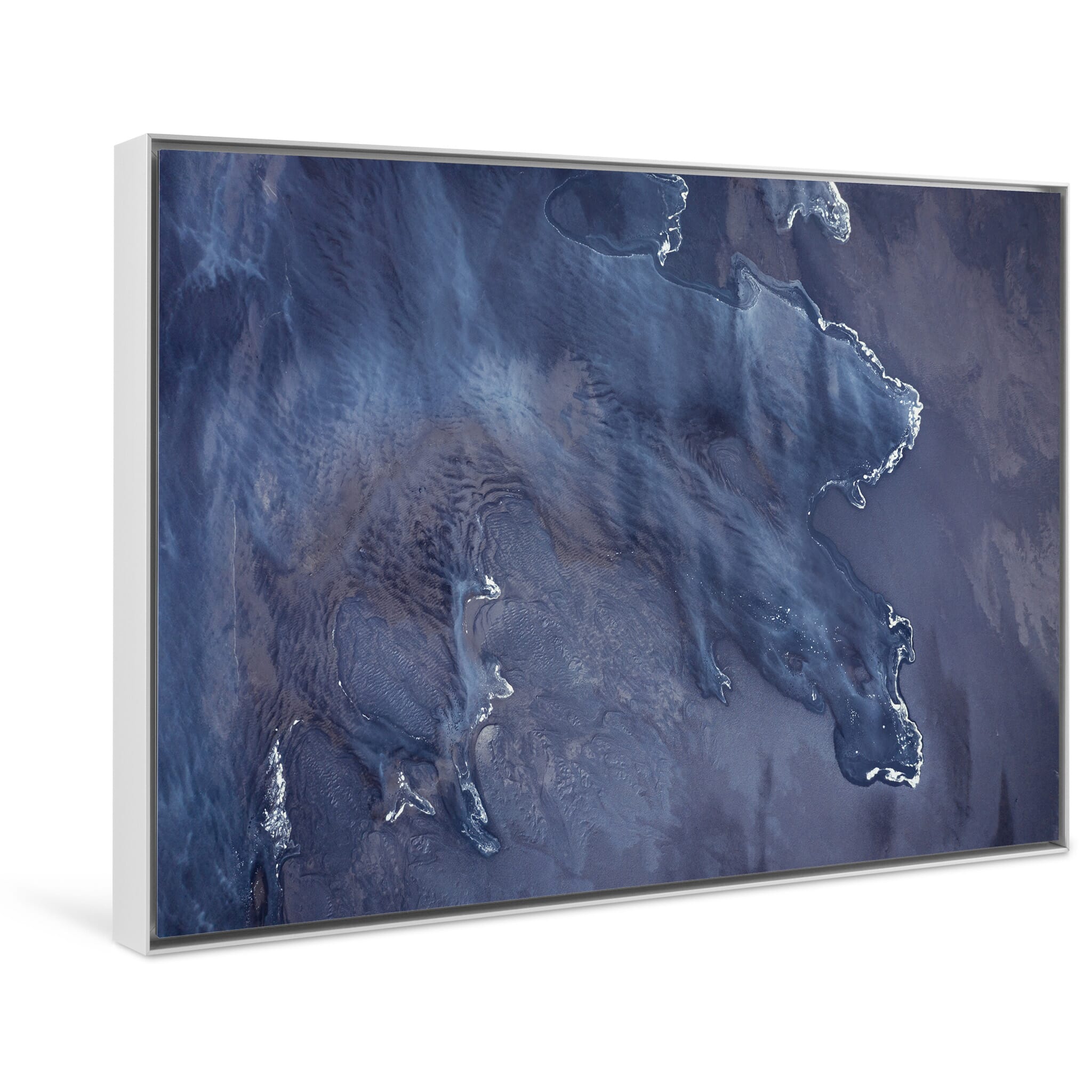 Framed photo print of tide meeting river flow along Iceland’s southern shoreline