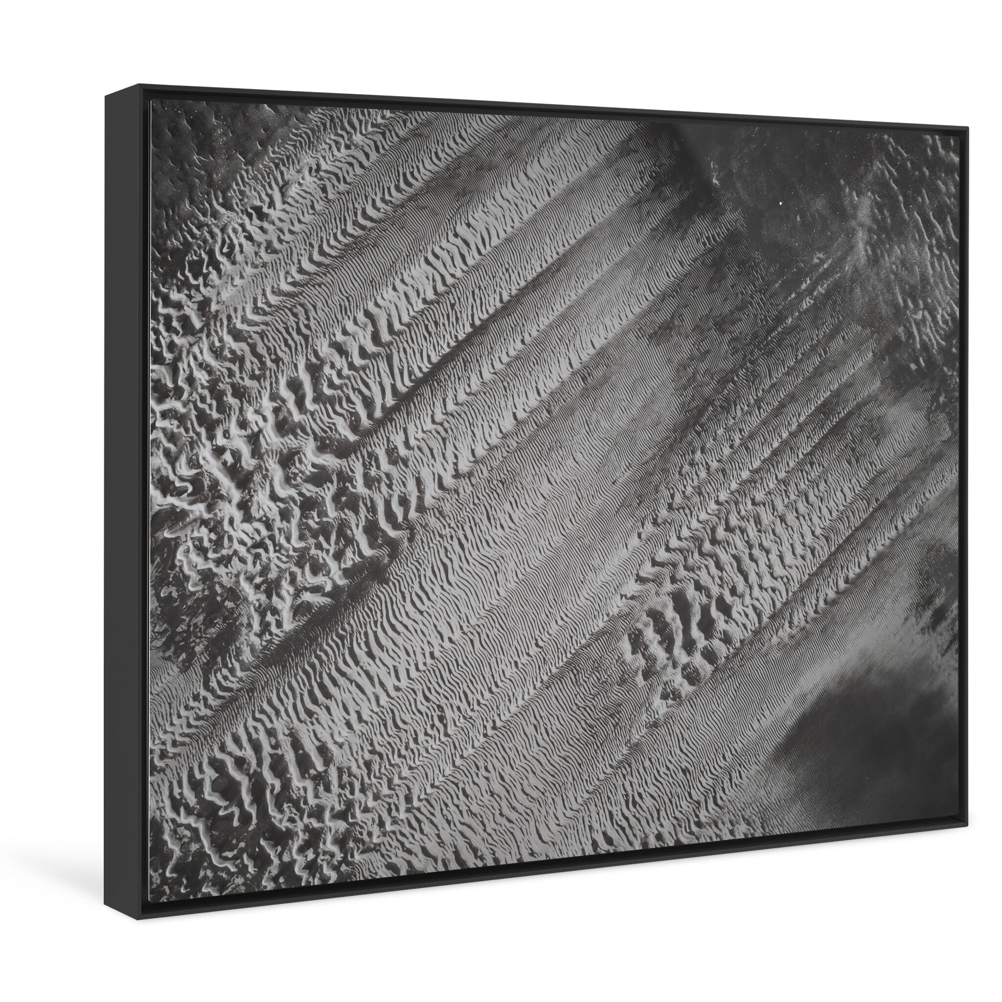 Framed photo print of wave-like sediment textures at low tide