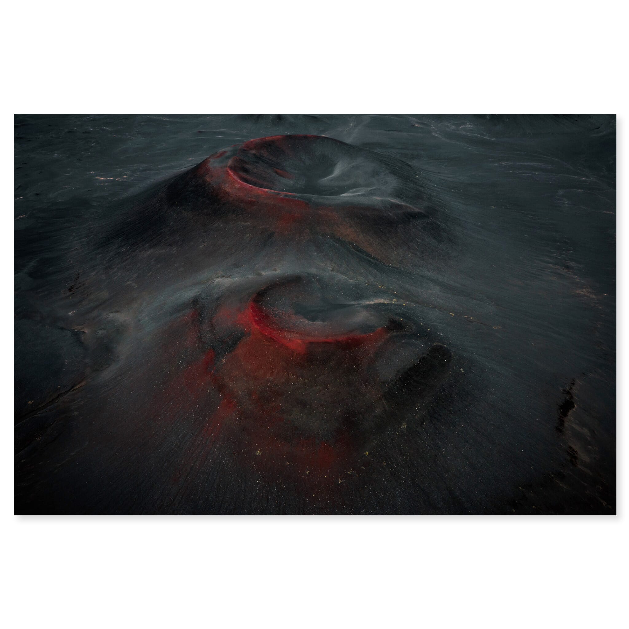 Fine art print of an aerial volcano crater in Iceland with wet sand and red rock