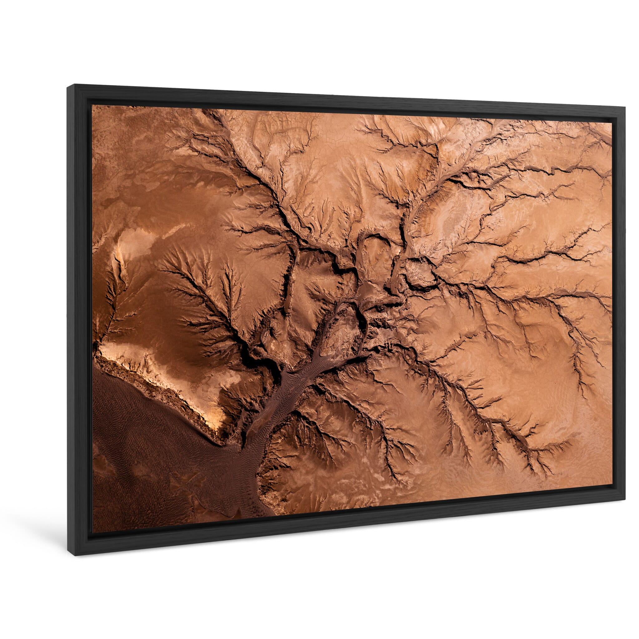 Framed photo print of abstract landscape shaped by erosion and water flow