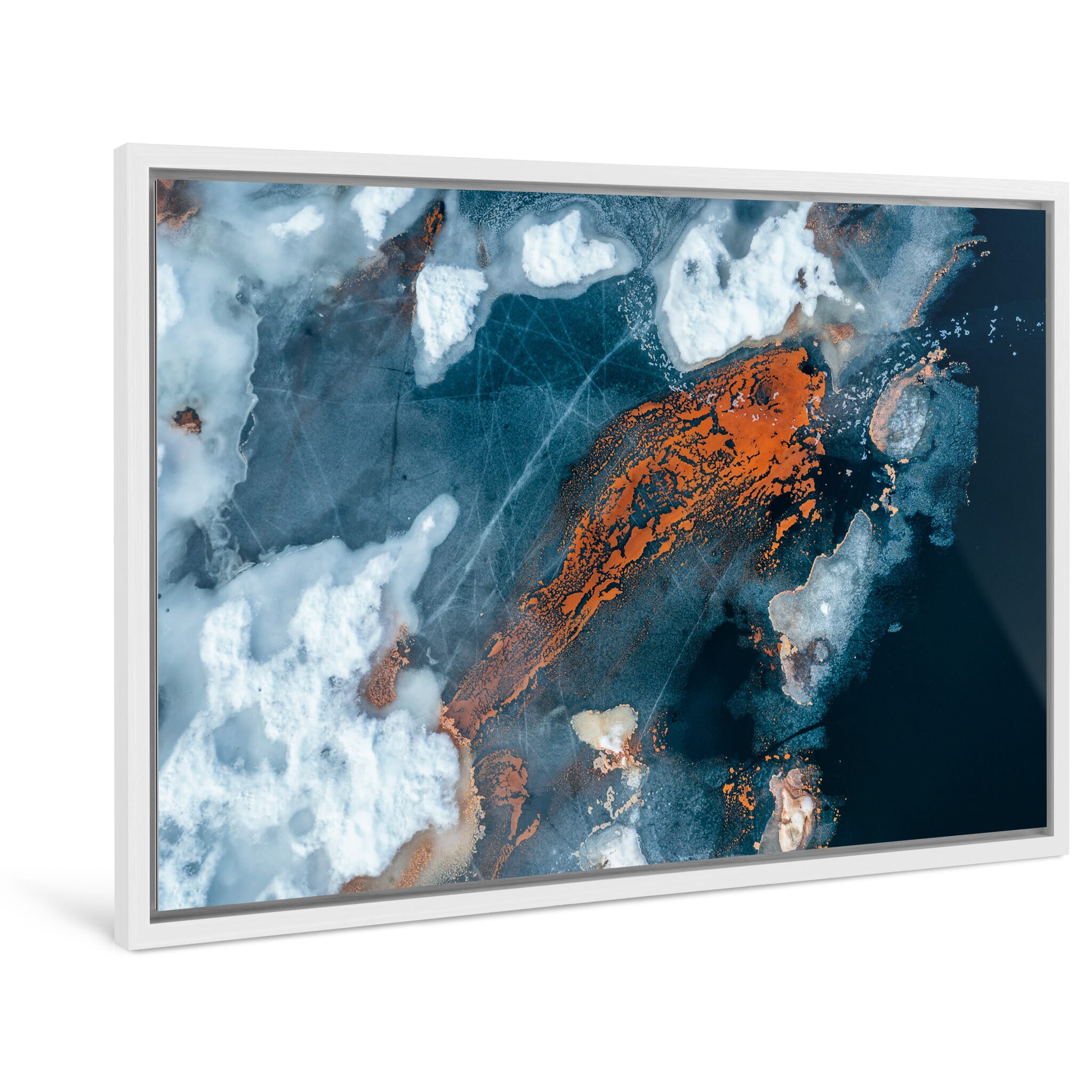 Framed photo print of early summer lake with rust-red swirls and melting ice