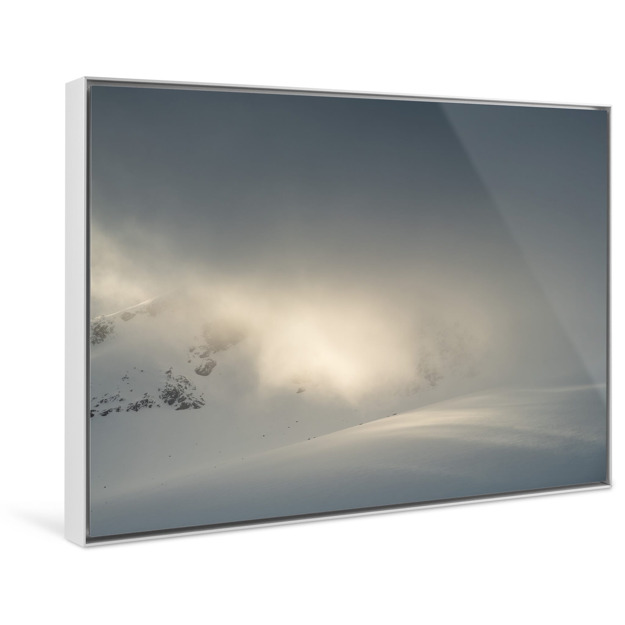 Framed photo print of snowy highland landscape with striking natural light effect