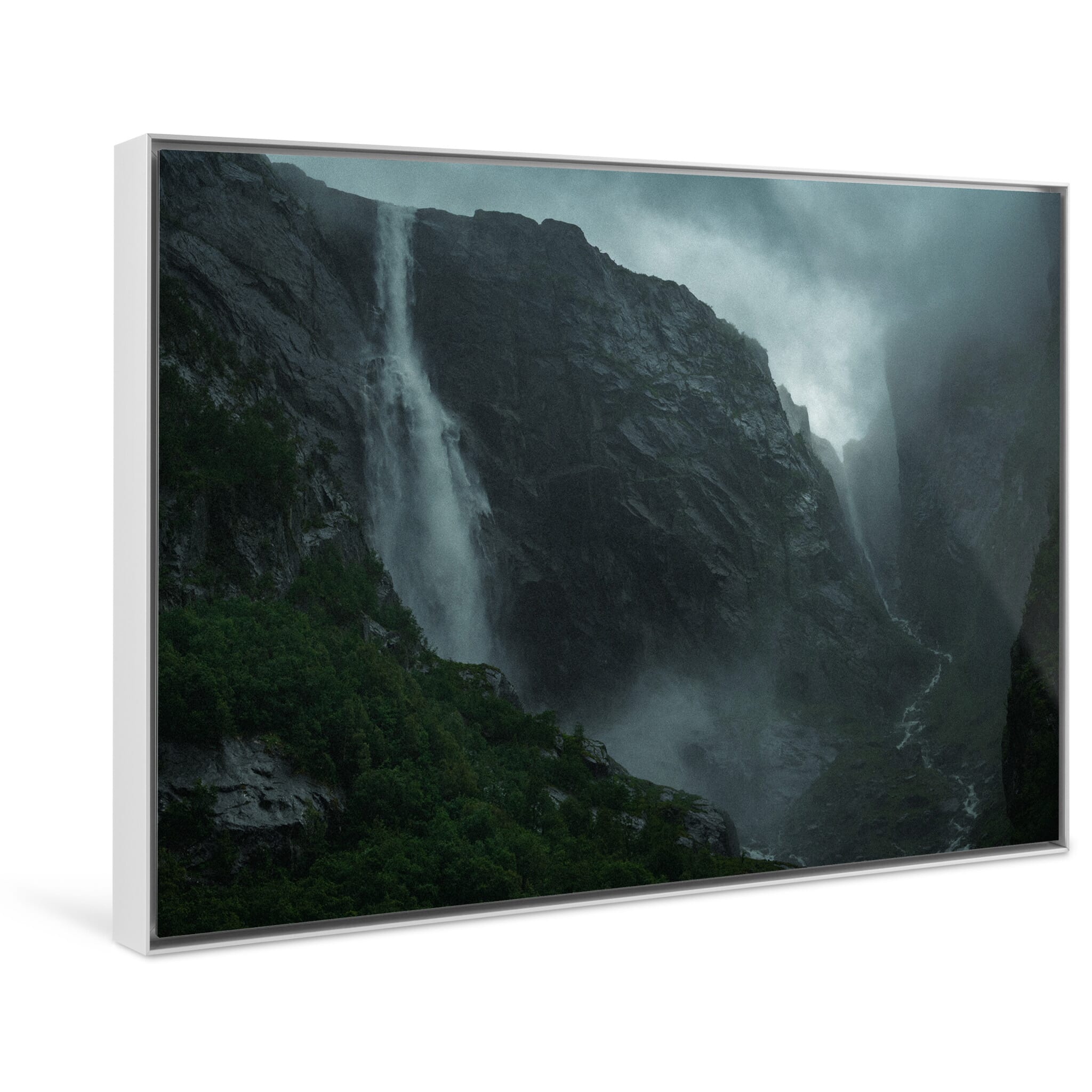 Framed photo print of atmospheric view of waterfall and rugged rock face