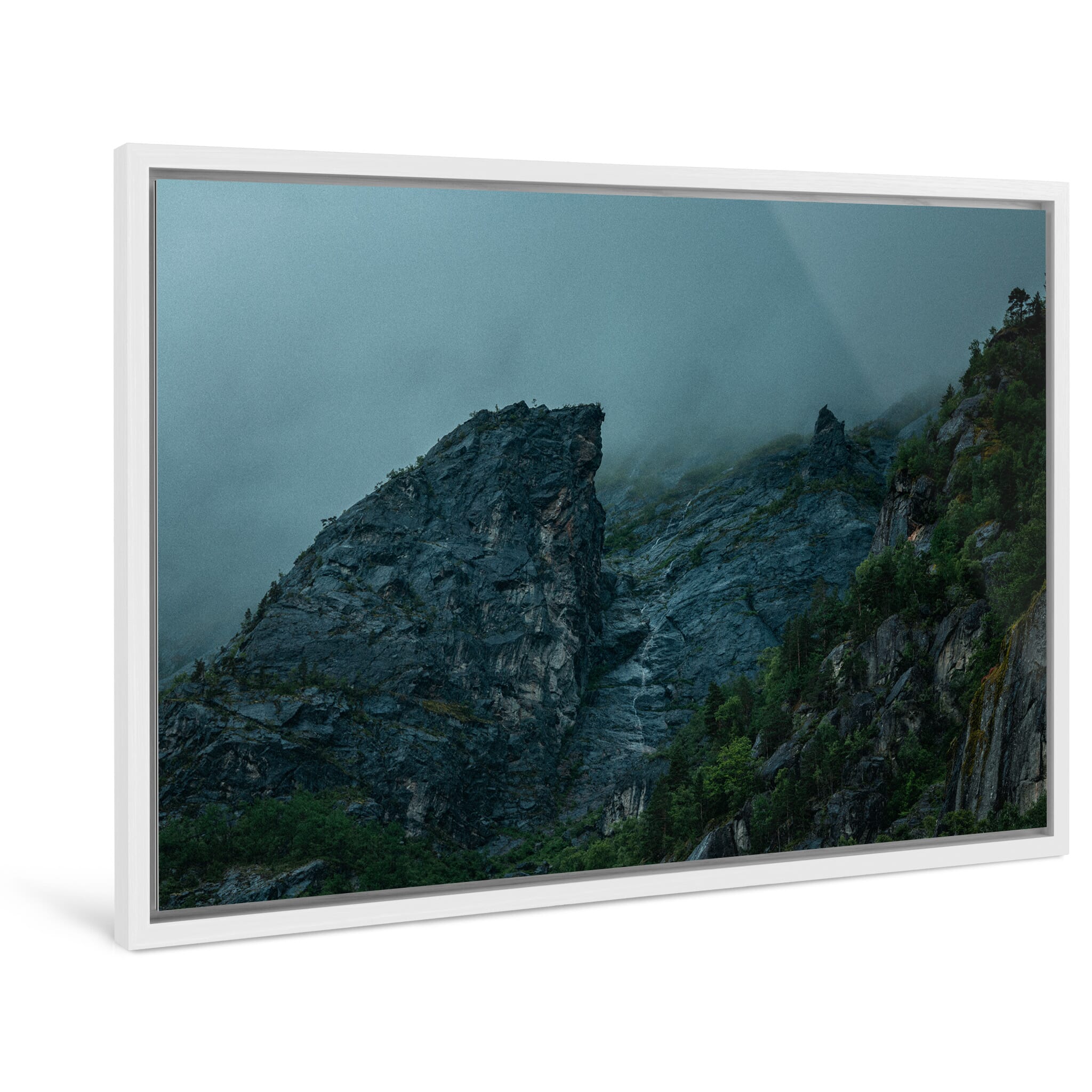 Framed photo print of dramatic fjord cliffs in subdued monochrome tones