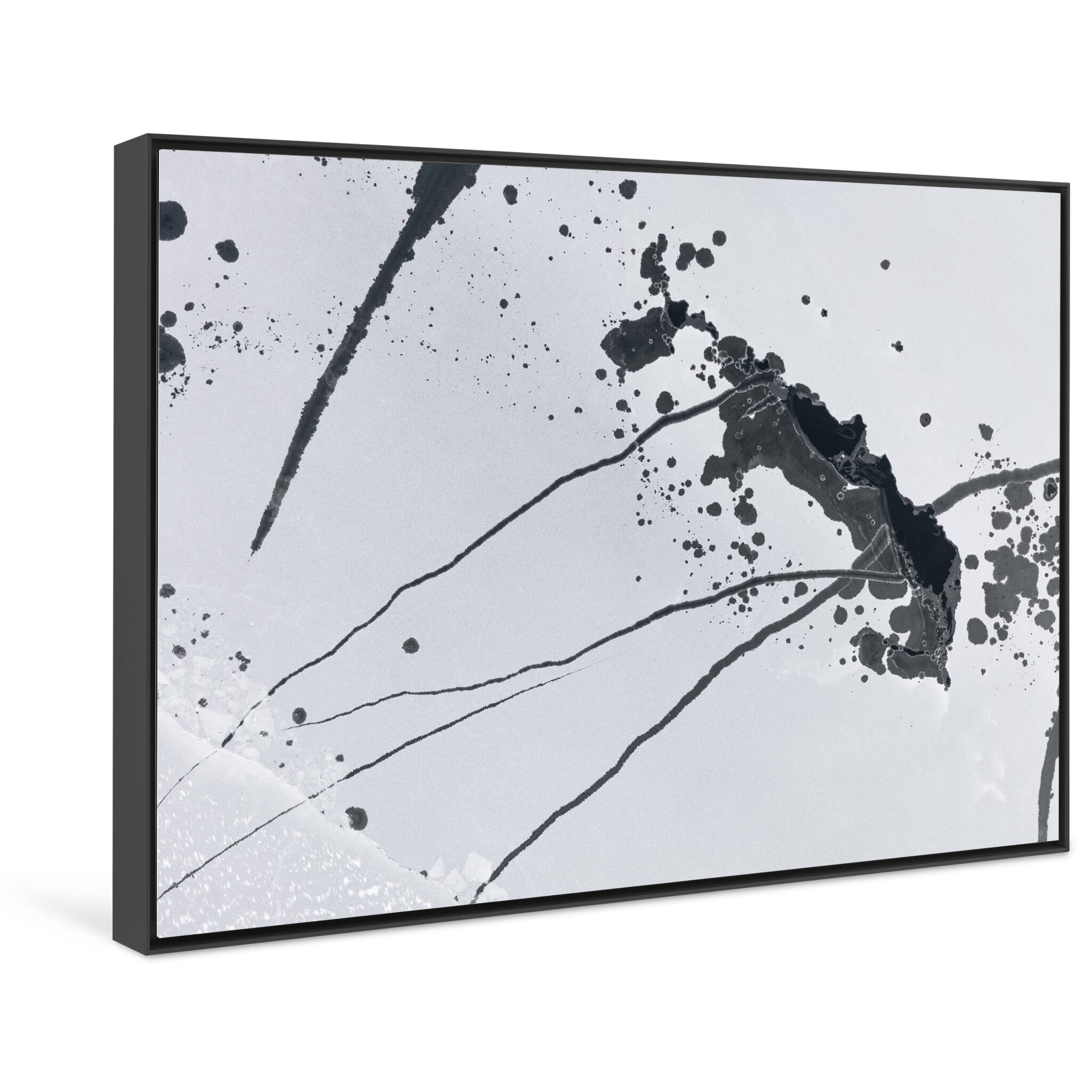 Framed photo print of cracked and broken ice forming arrow-like snowdrift patterns