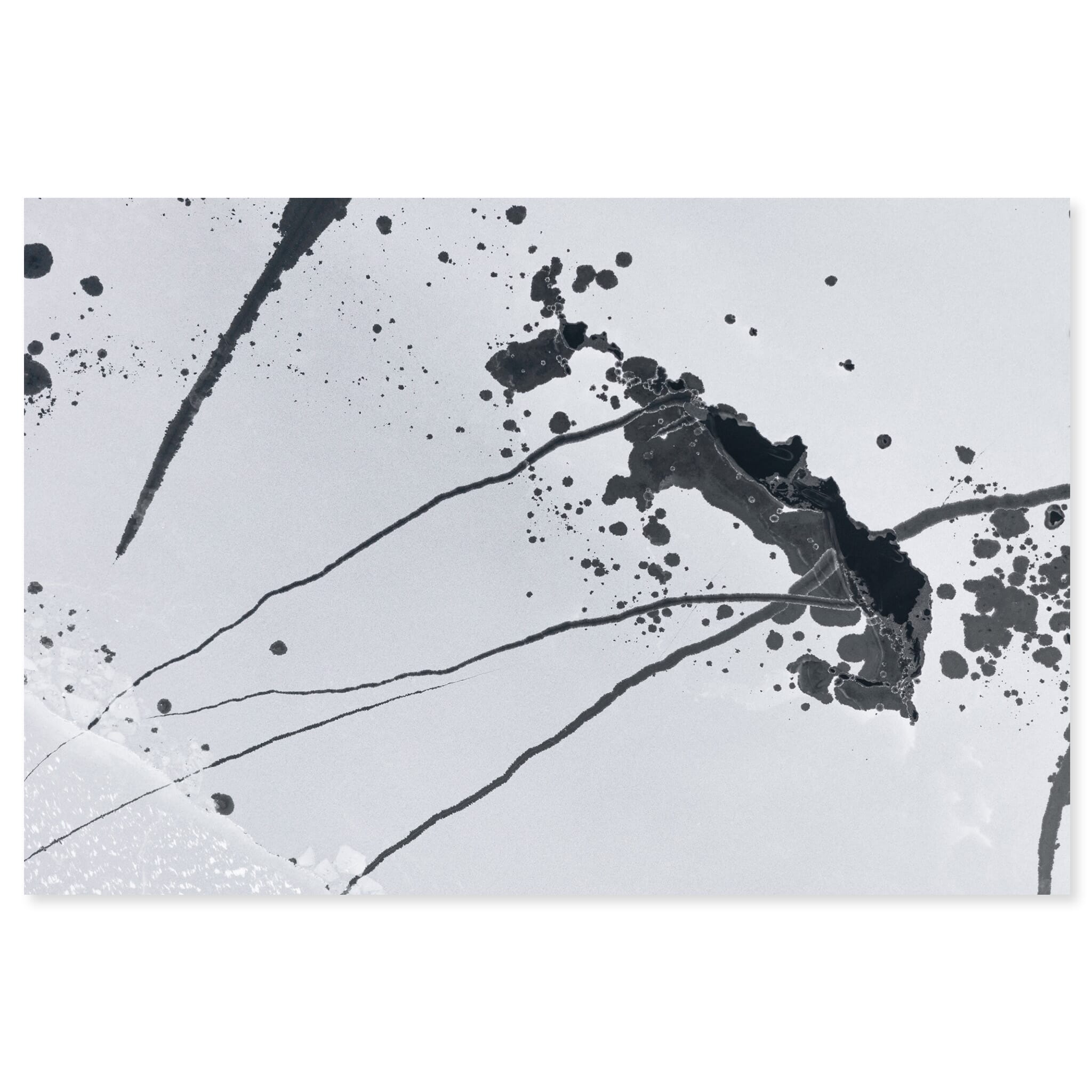 Fine art print of abstract patterns with melted holes and cracks in frozen lake ice