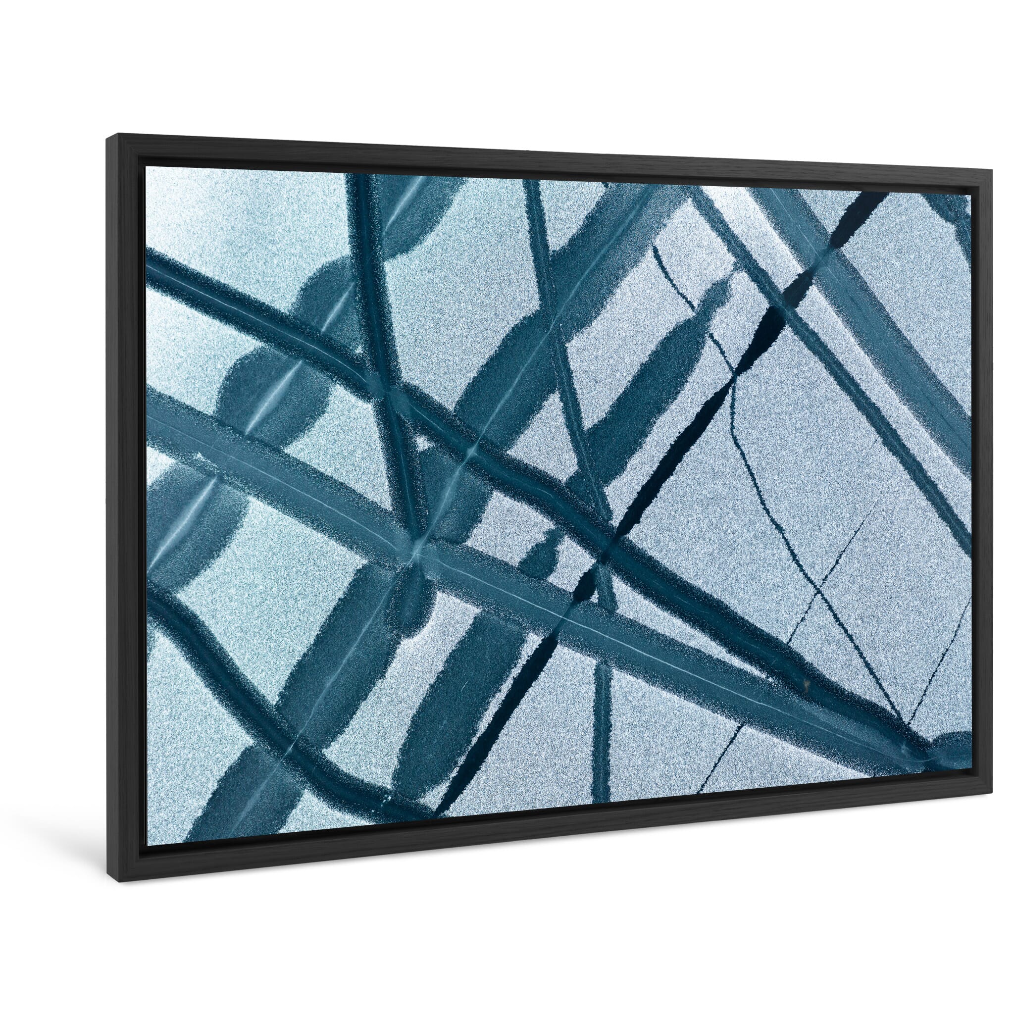 Framed photo print of bird’s-eye view of natural ice channels and dark openings