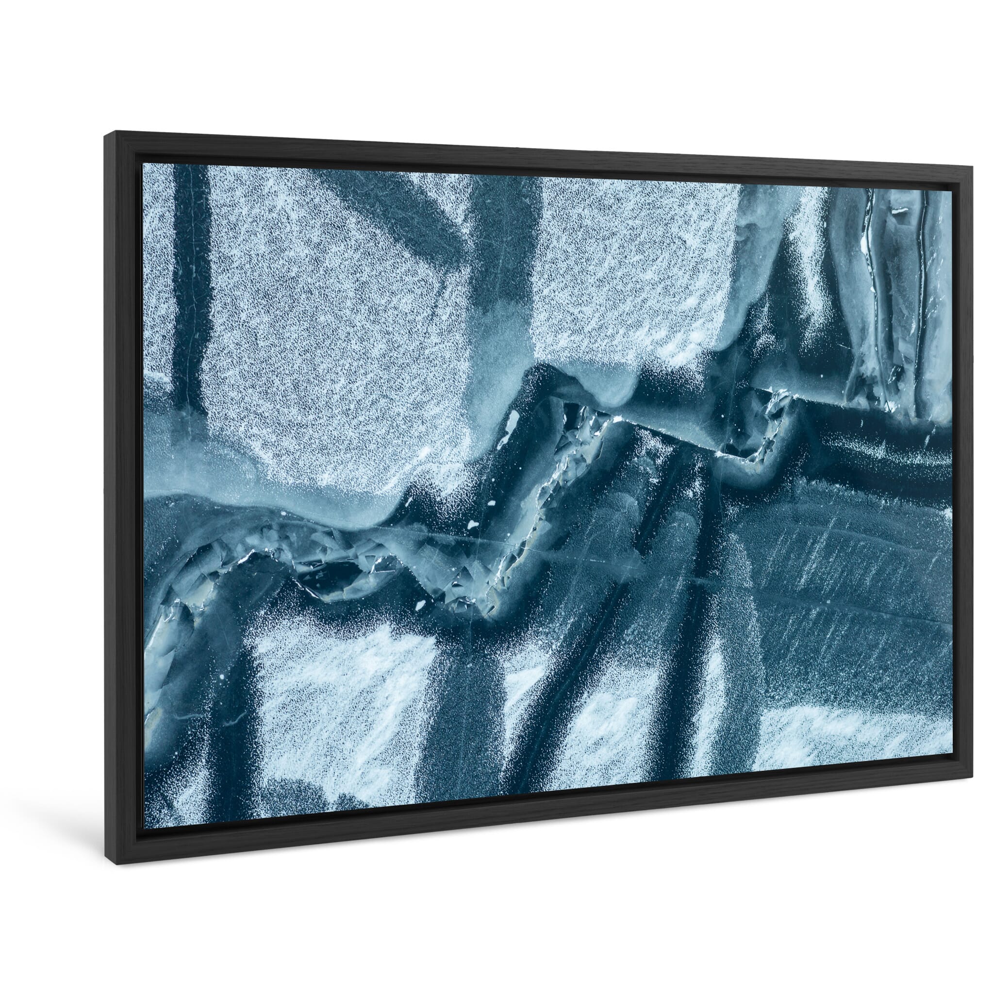 Framed photo print of intricate crack formations in vibrant blue frozen surface