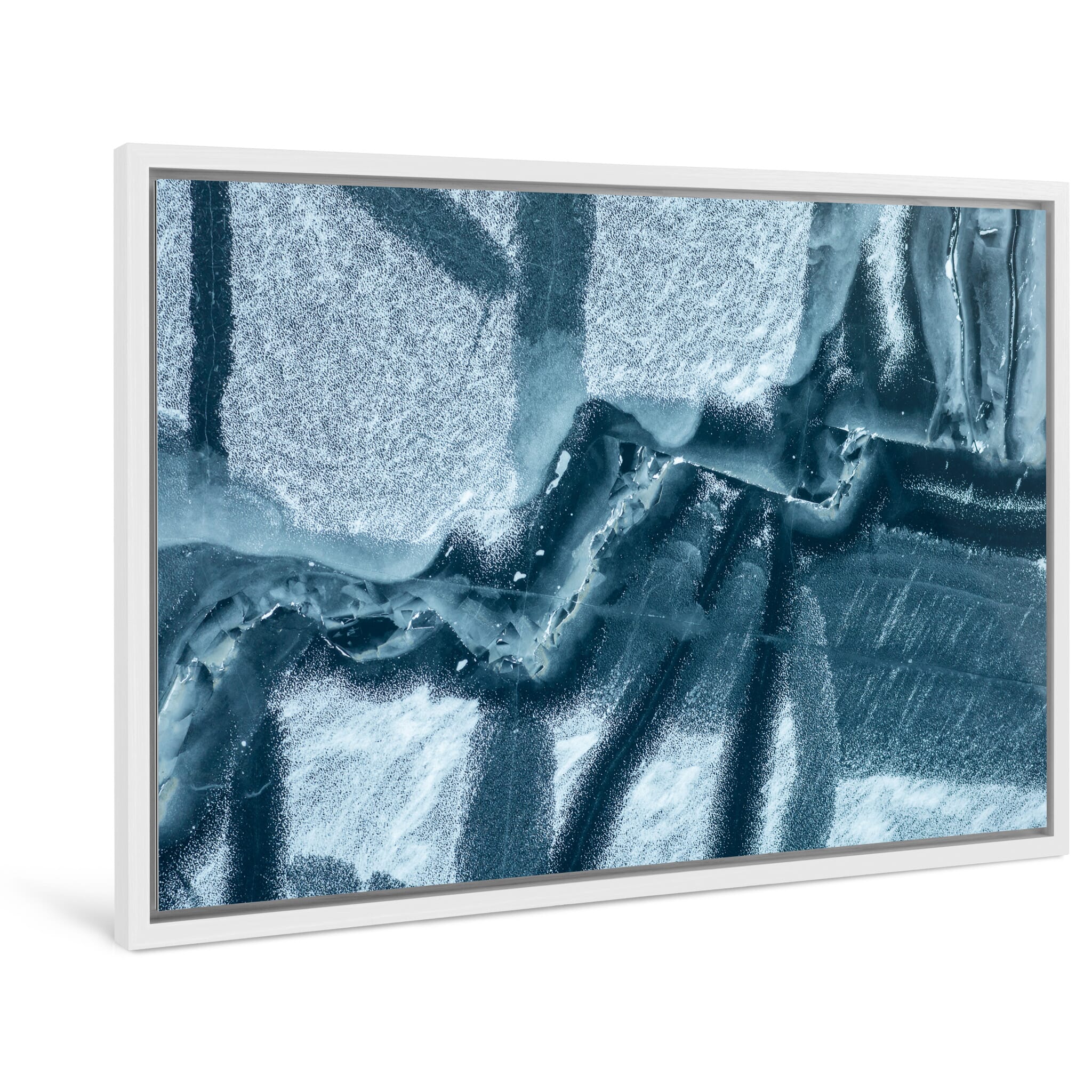 Framed photo print of abstract ice maze with crossing fracture lines in cold terrain