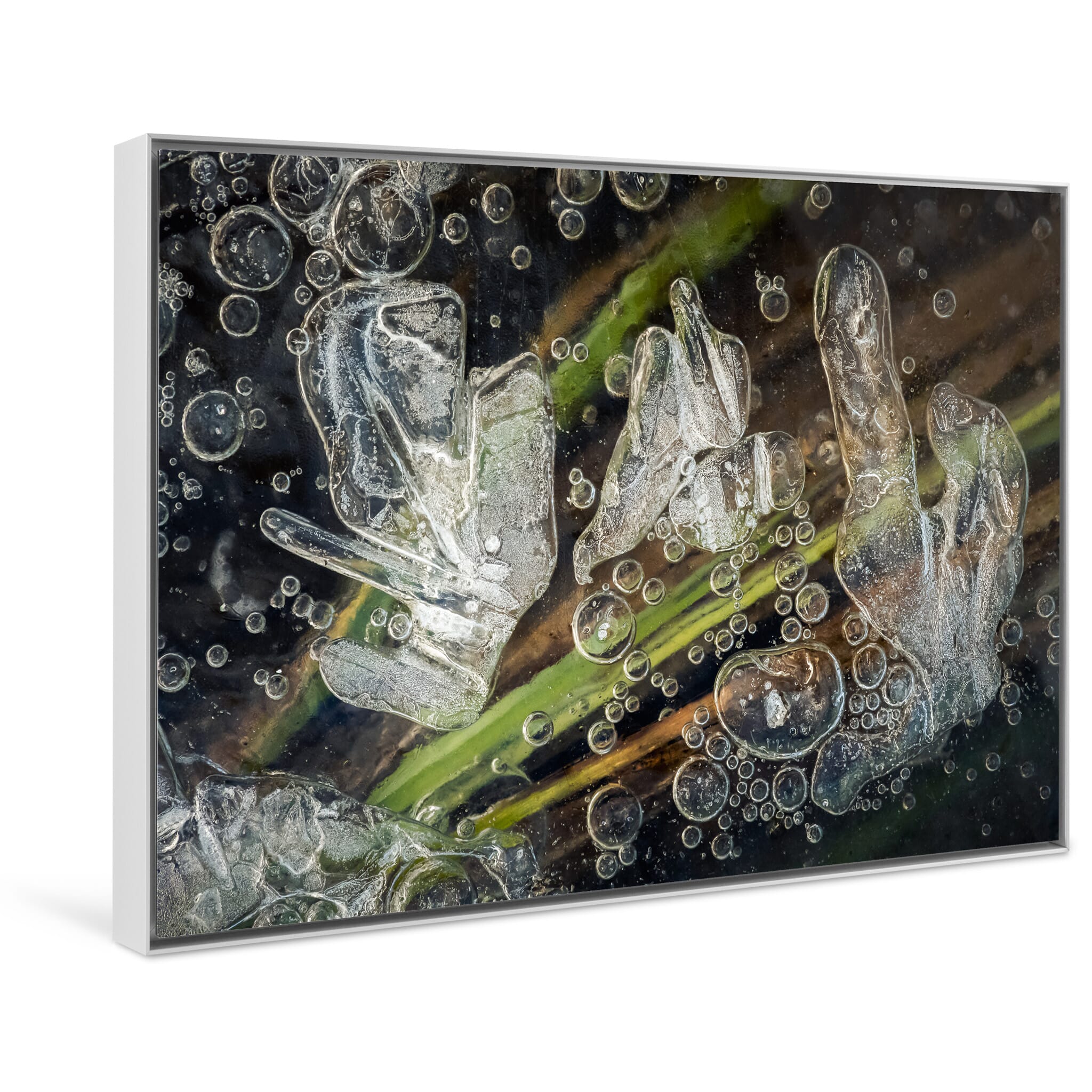 Framed photo print of natural winter patterns with layered ice, bubbles, and trapped plant matter in Norway