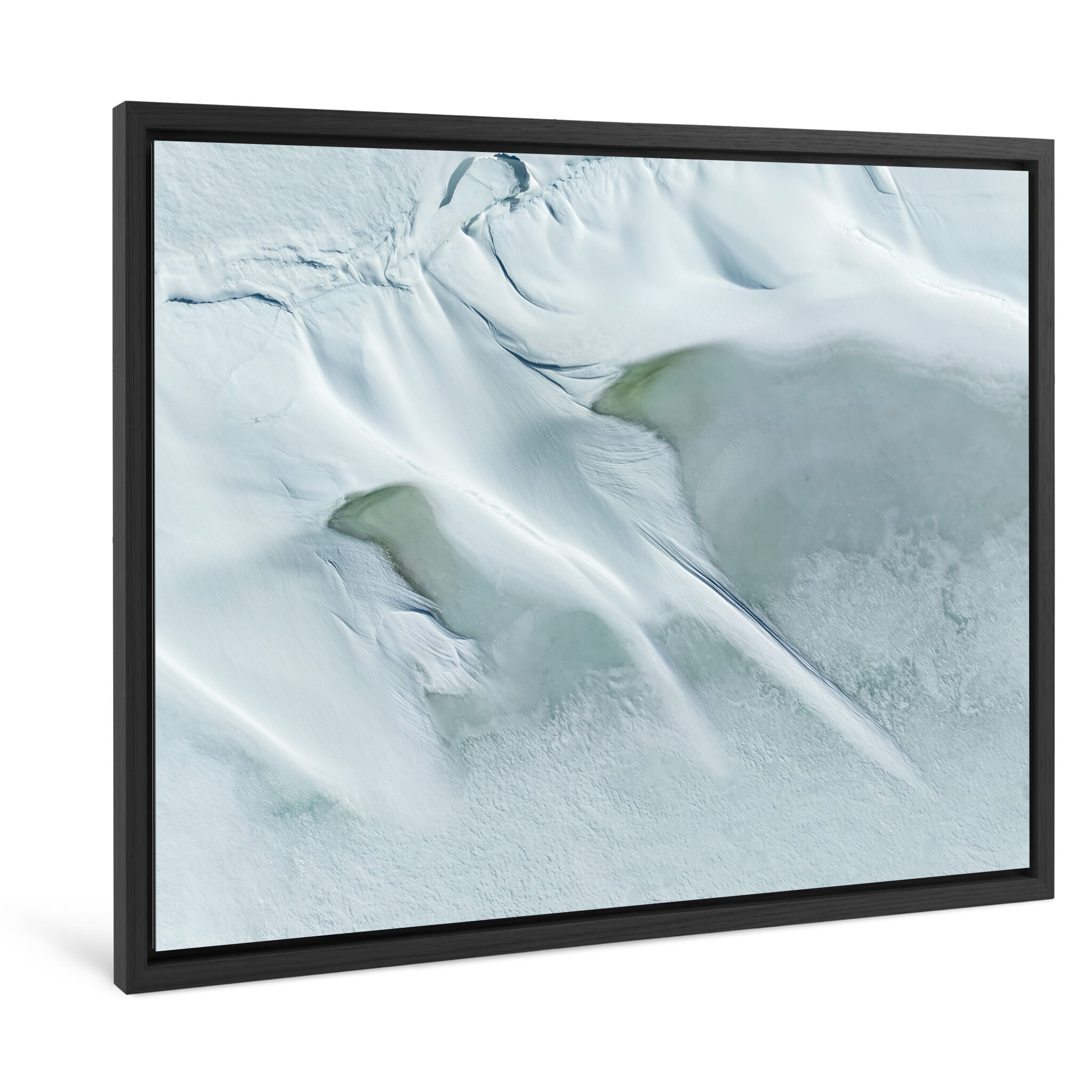 Framed photo print of winter textures with snow drifts and turquoise ice