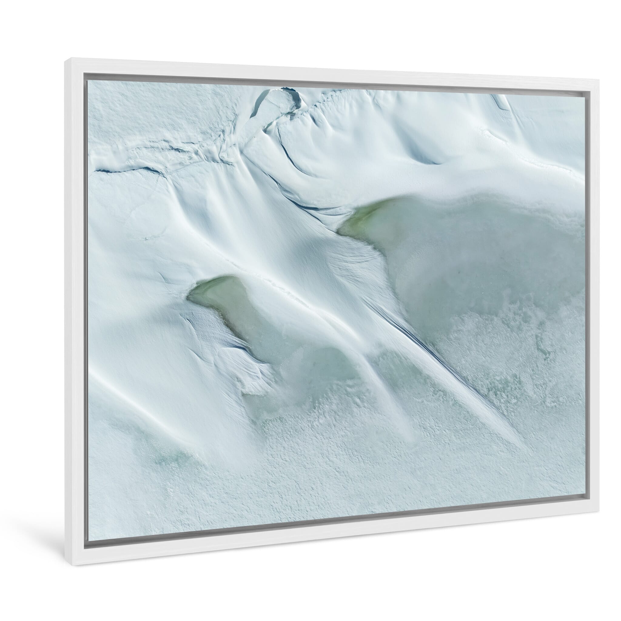 Framed photo print of snow-covered lake surface with layered textures