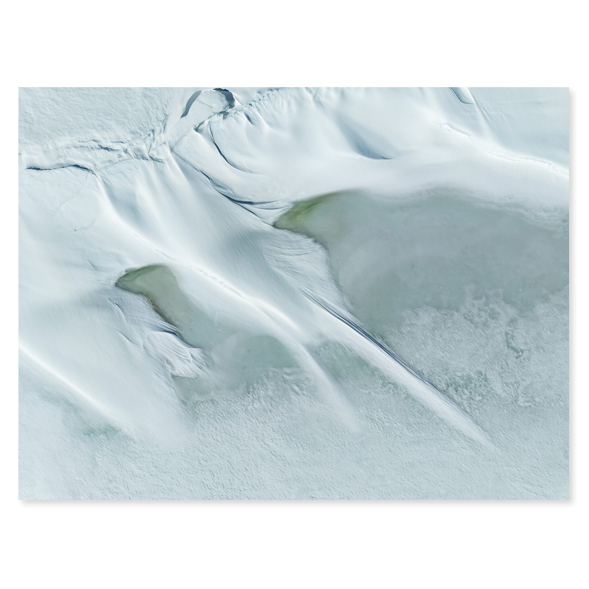 Fine art print of a frozen mountain lake on the Hardangervidda plateau with wind-shaped snow patterns