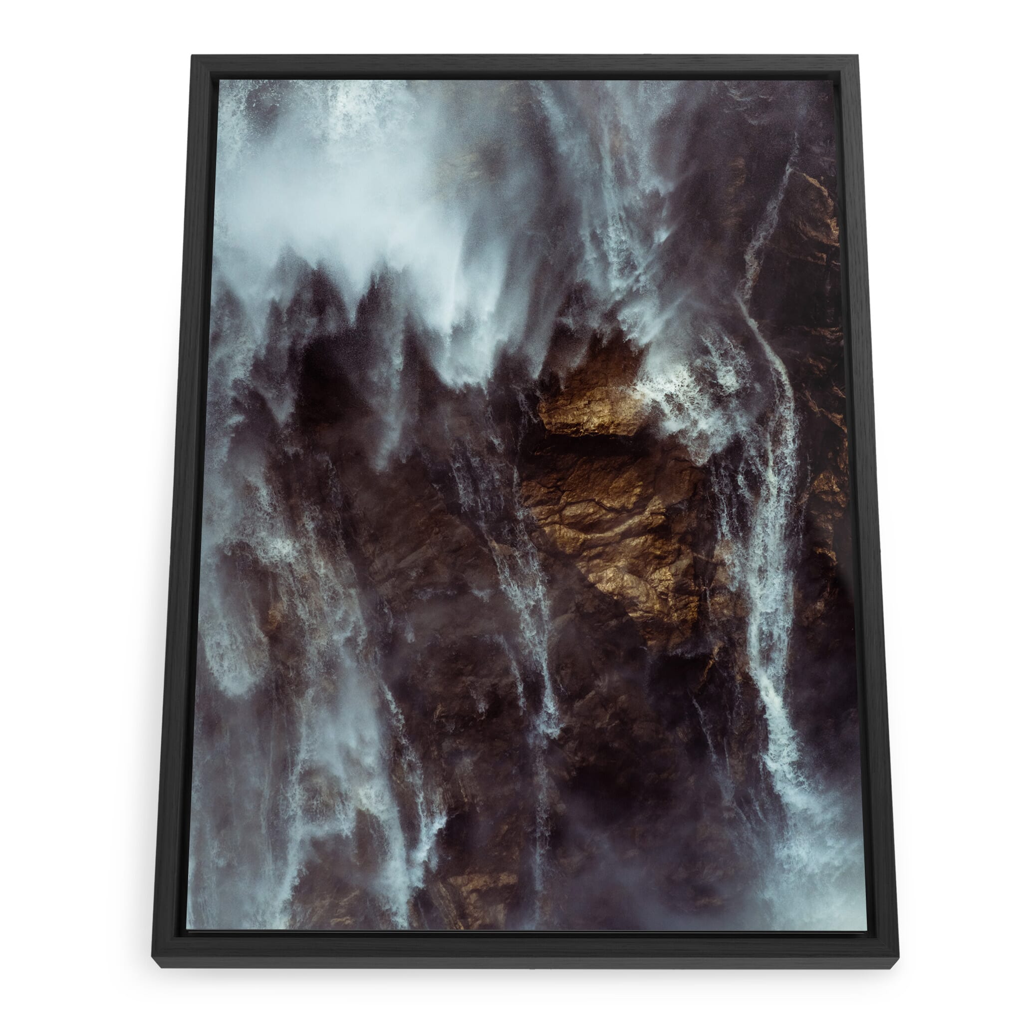 Framed photo print of rugged cliffs and powerful waterfall