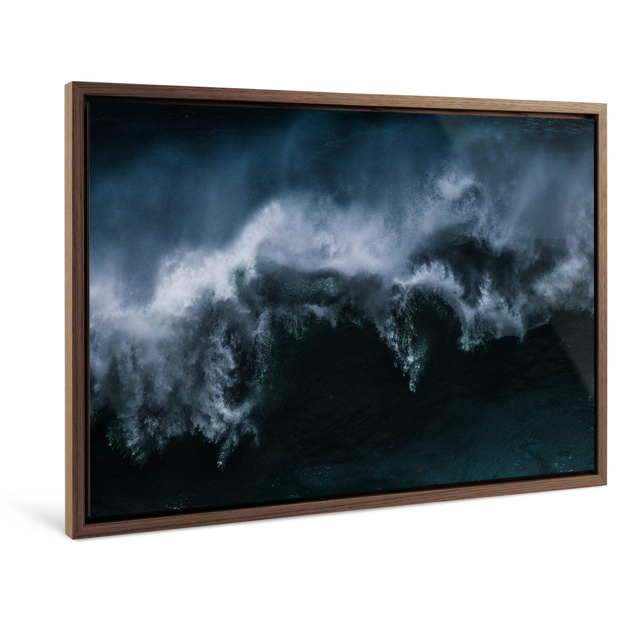 Framed photo print of stormy sea and collapsing wave under low light conditions