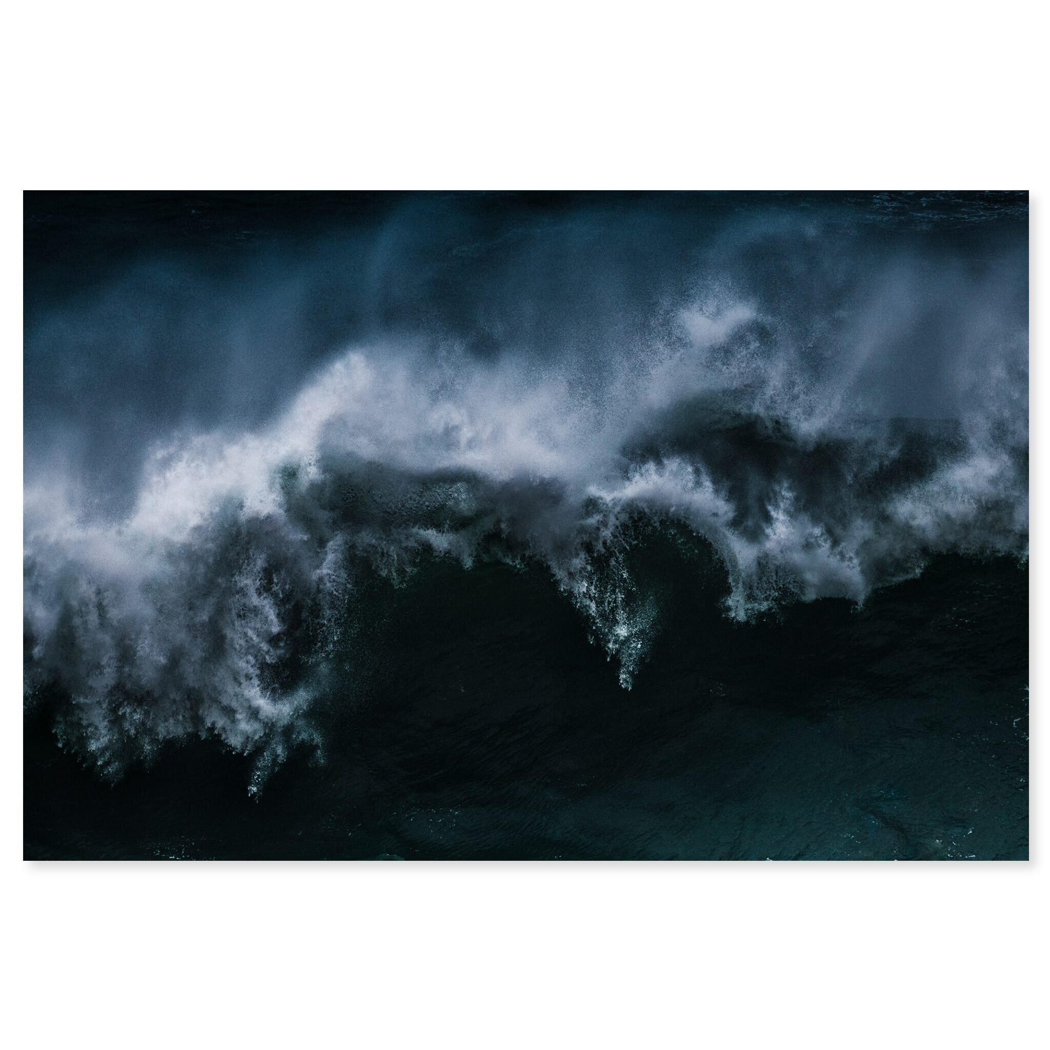 Fine art print of a powerful breaking wave in Nazaré captured during a winter storm