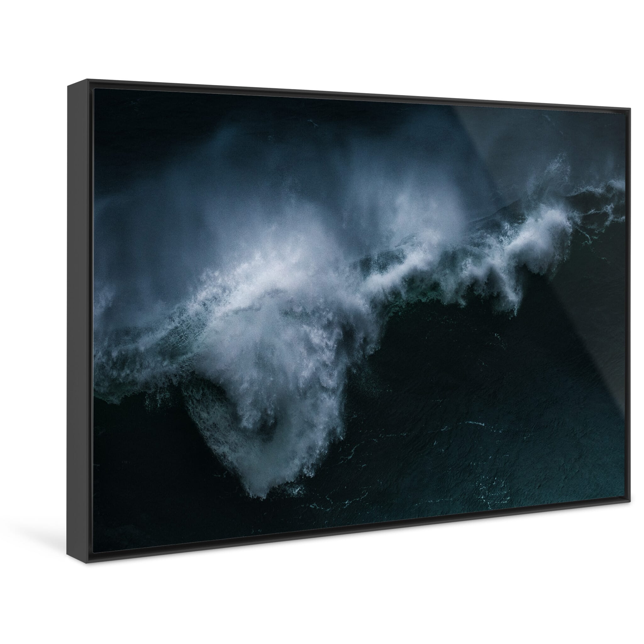 Framed photo print of moody ocean scene showing wave collapse and spray