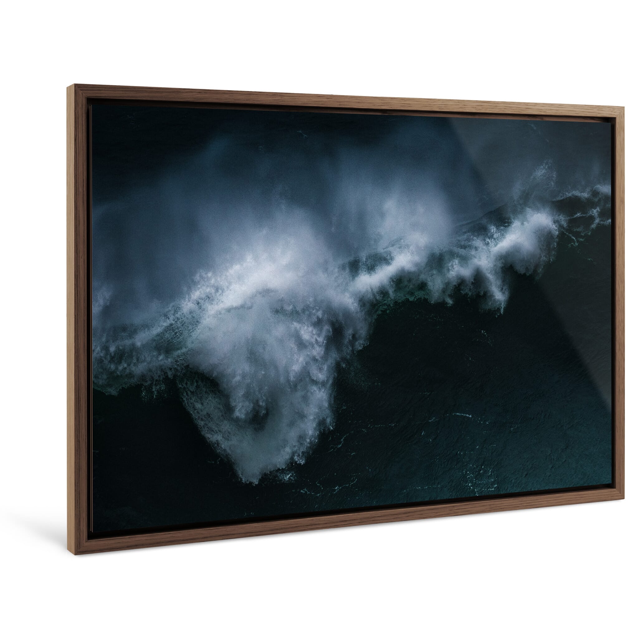 Framed photo print of wave formation with strong motion and dark water