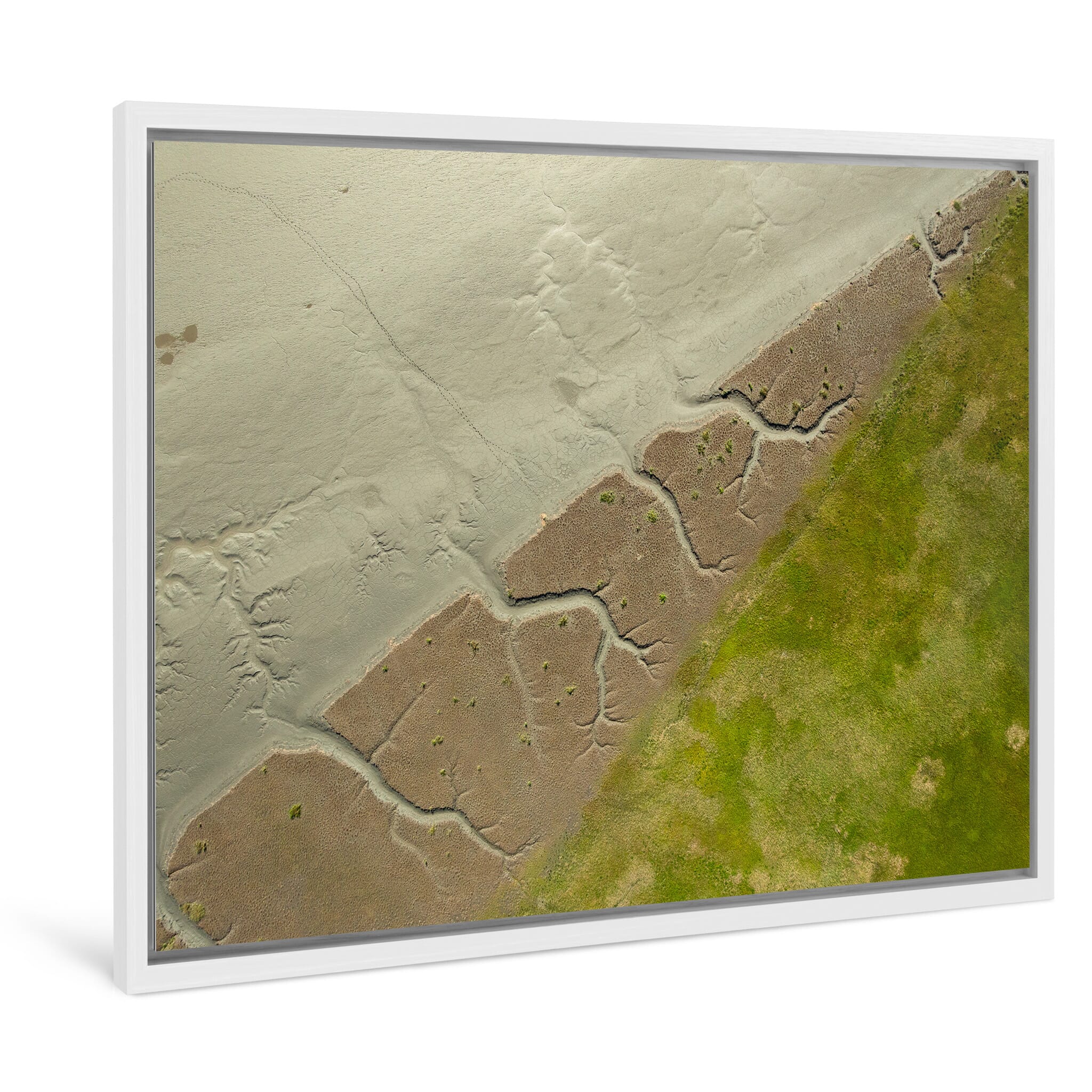 Framed photo print of layered patterns formed by low tide and sediment