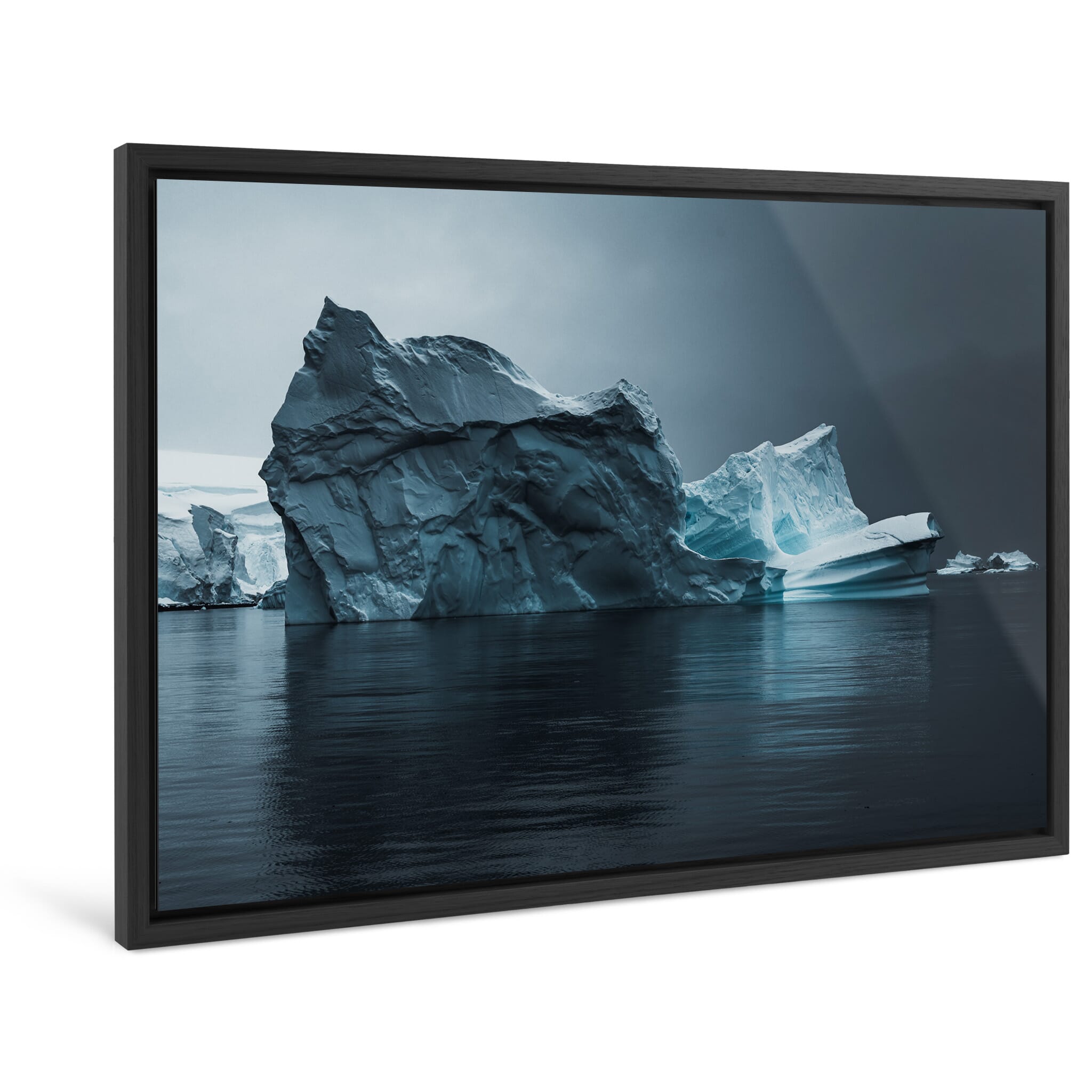 Framed photo print of a large iceberg showing carved ridges and channels