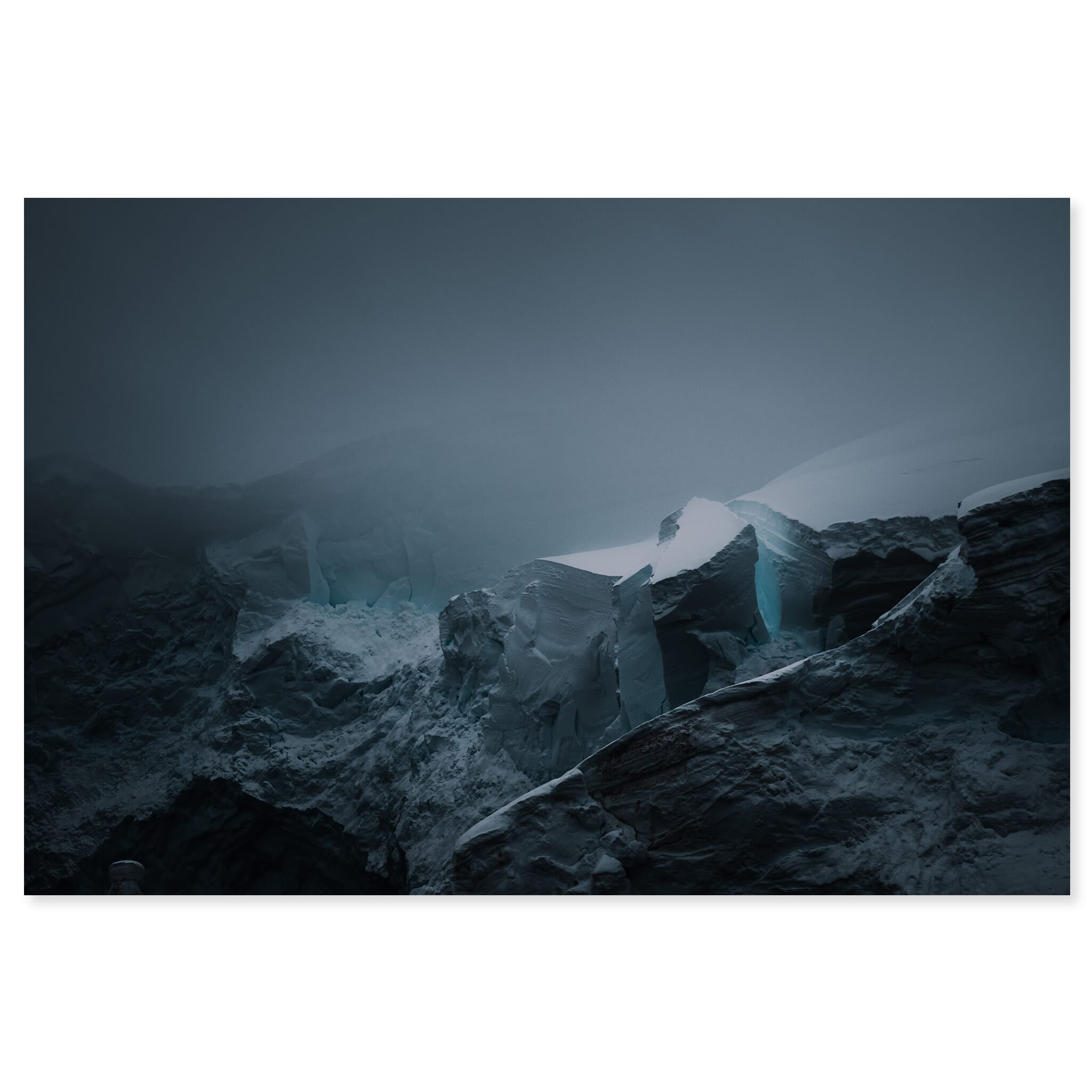 Fine art print of a dark moody glacier scene in Antarctica shrouded in fog