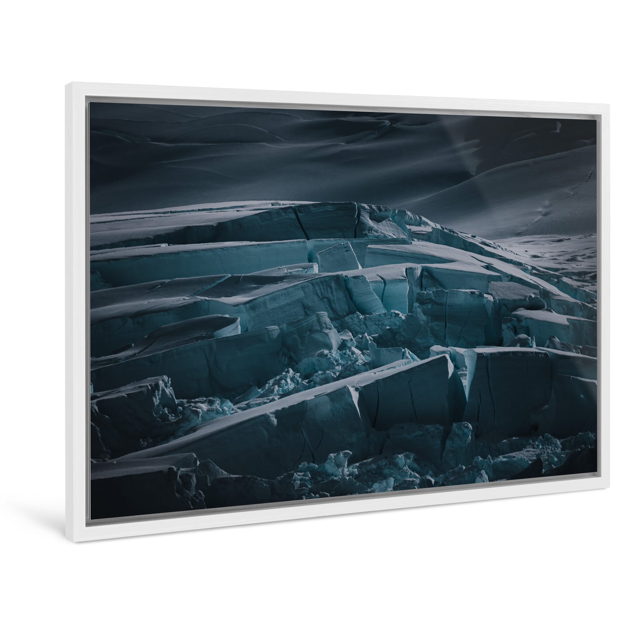 Framed photo print of jagged glacier edges revealing deep crevasses