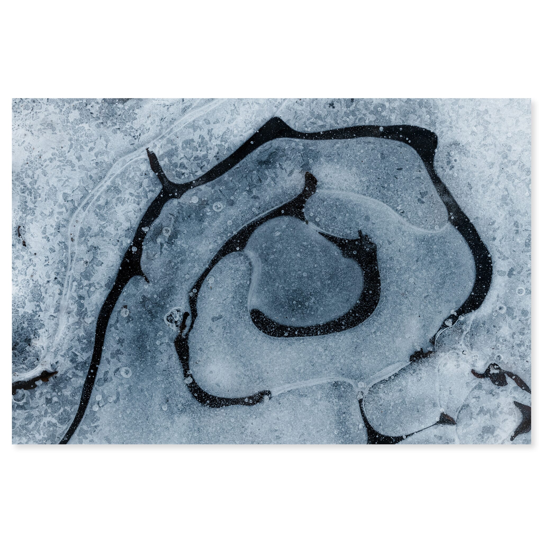 Fine art print of intricate ice patterns with trapped air bubbles in Germany