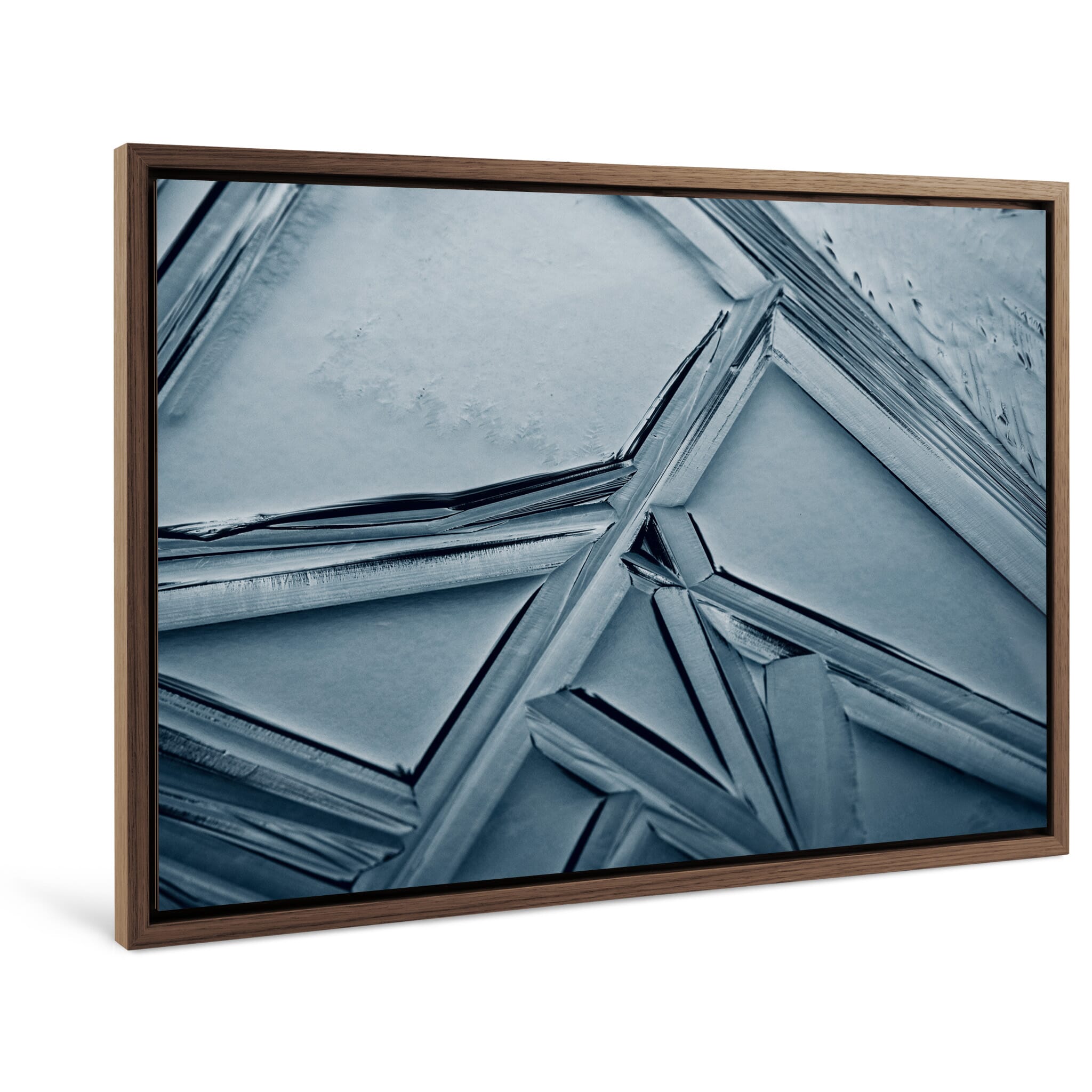 Framed photo print of ice structures with precise lines and angular textures