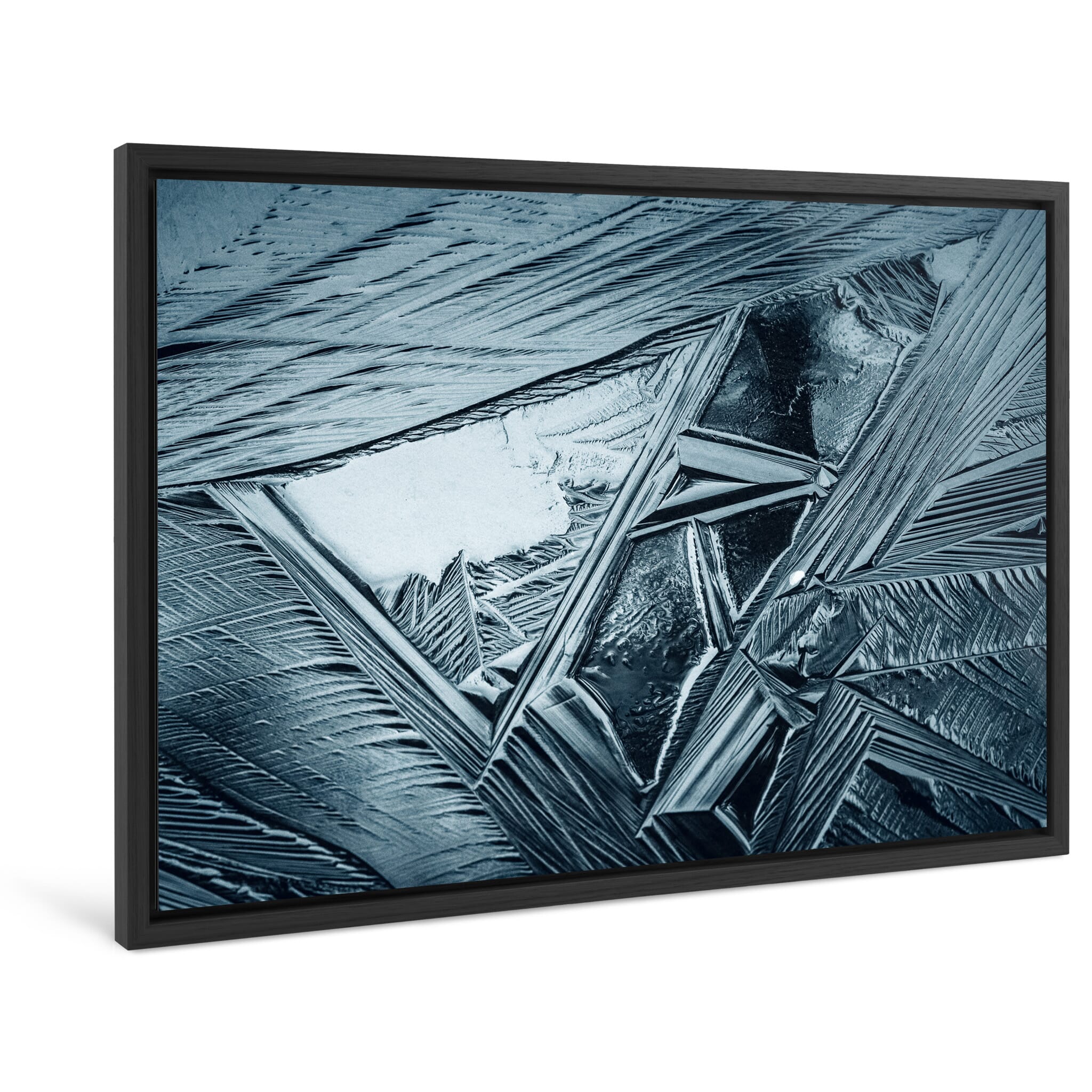 Framed photo print of abstract crystal patterns formed on natural ice surface