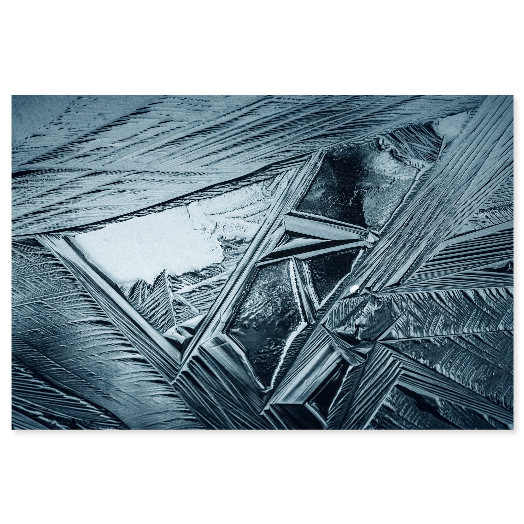 Fine art print of frozen pond surface with precise geometric ice structures in Germany