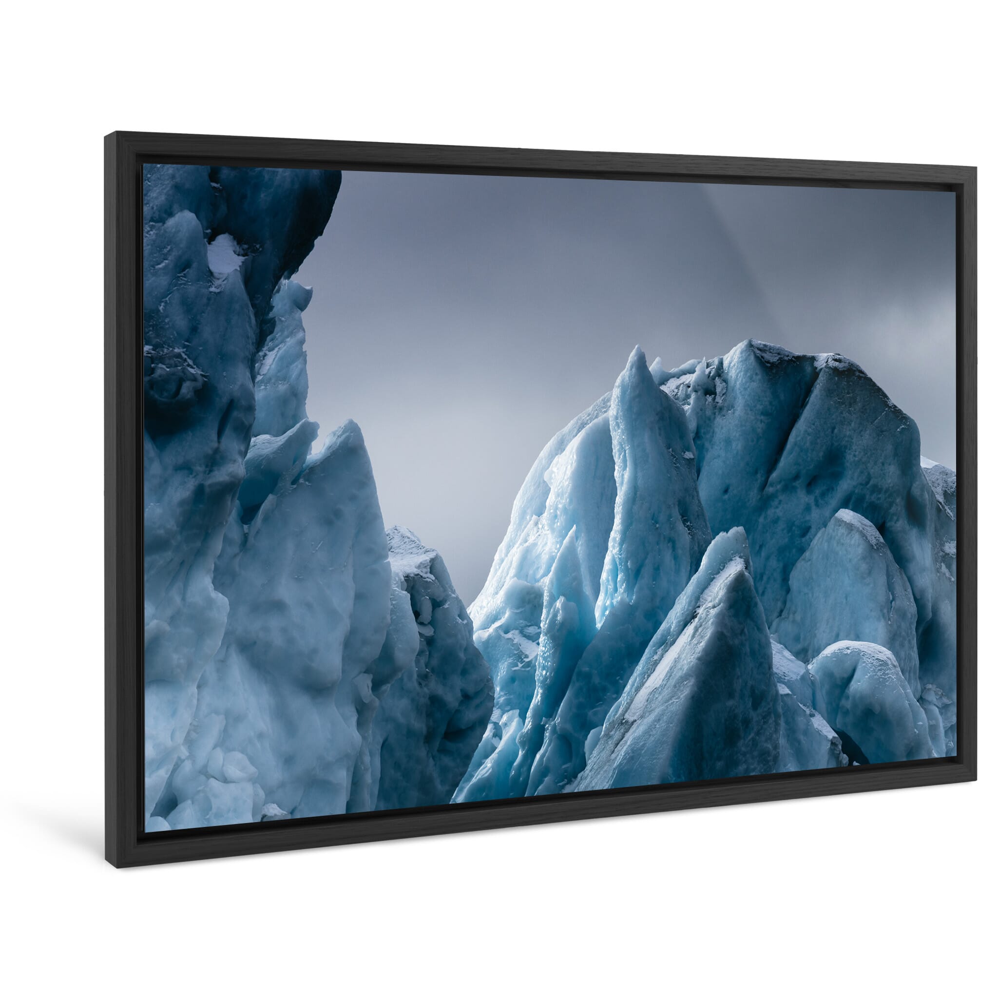 Framed photo print of blue iceberg formations with sharp textures