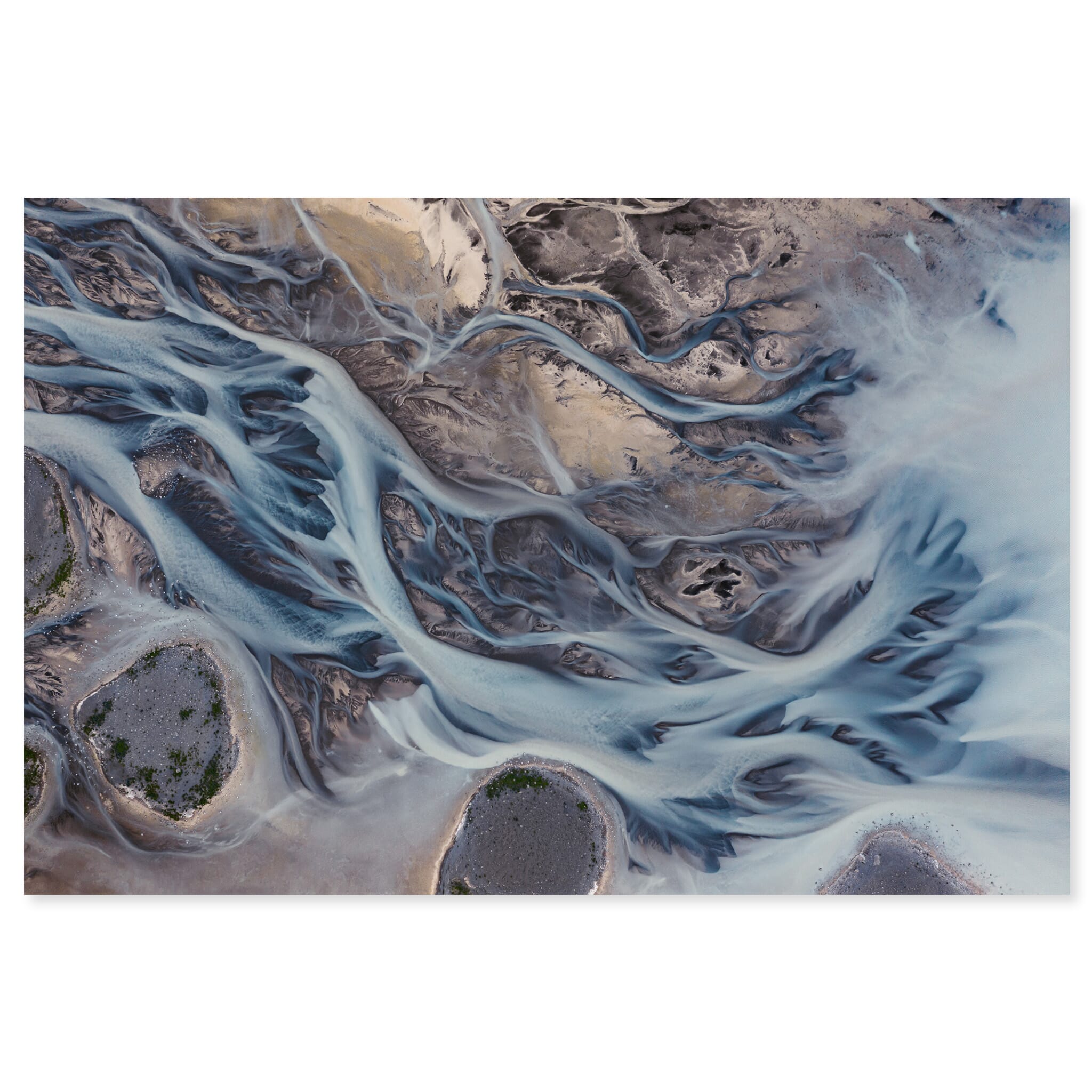 Fine art print of an aerial glacial river in Iceland blending blue and brown tones