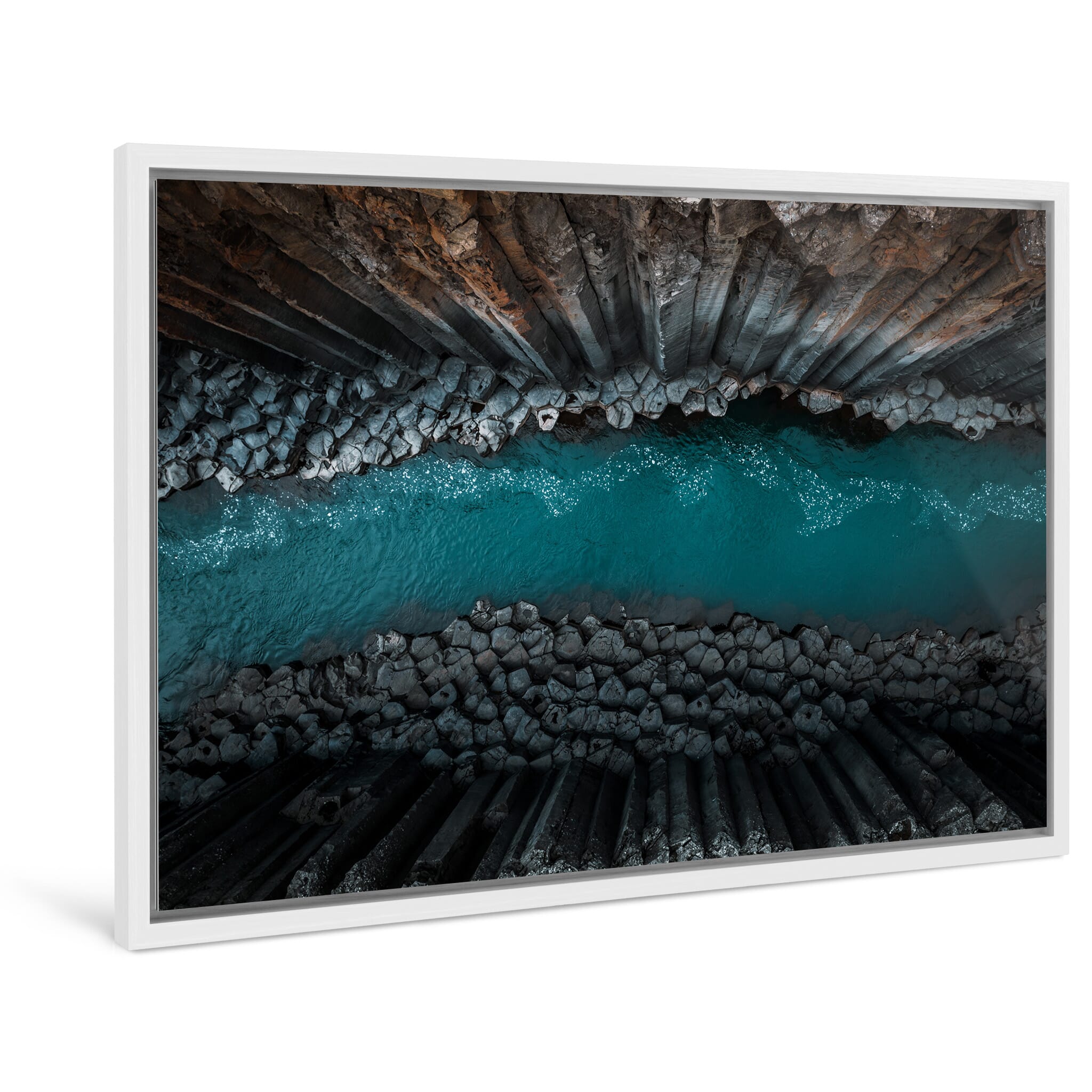 Framed photo print of steep canyon walls revealing layered basalt structures