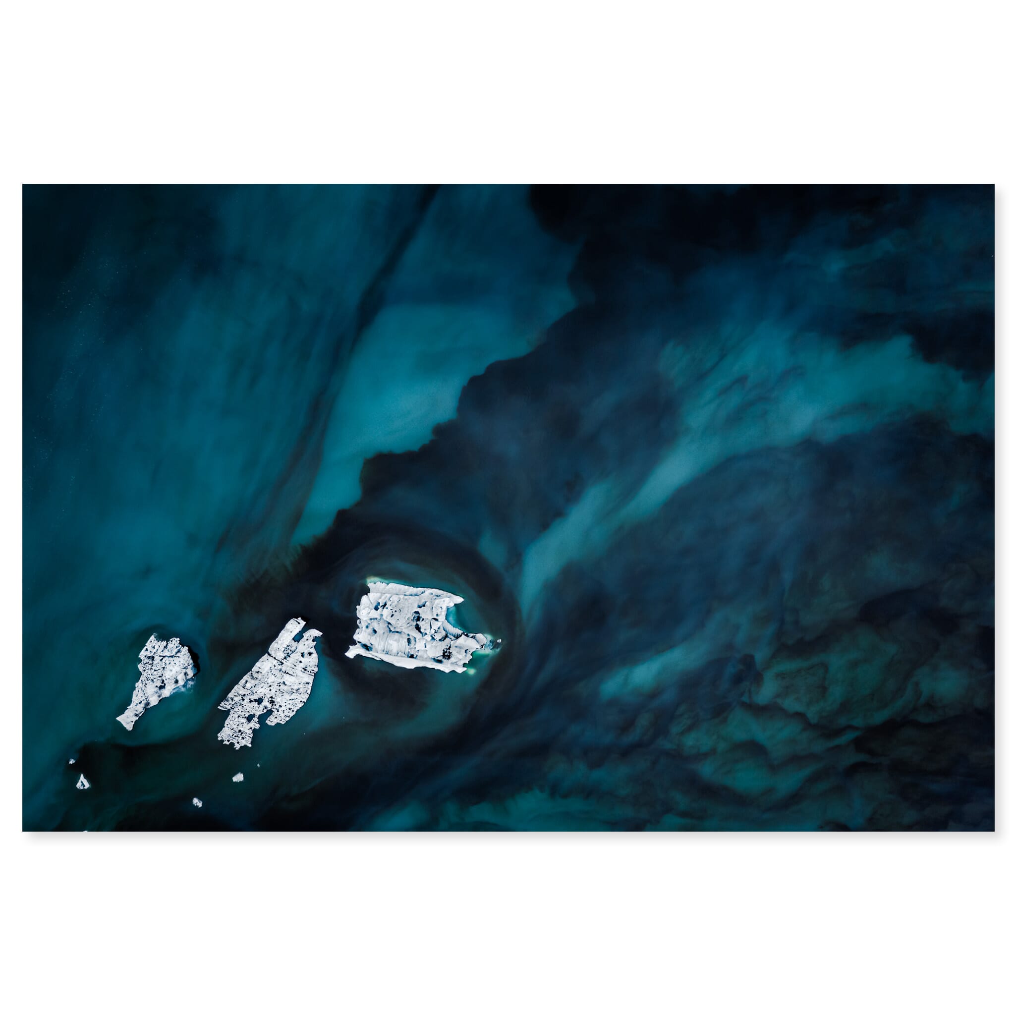 Fine art print of drifting icebergs on a glacial lagoon in Iceland