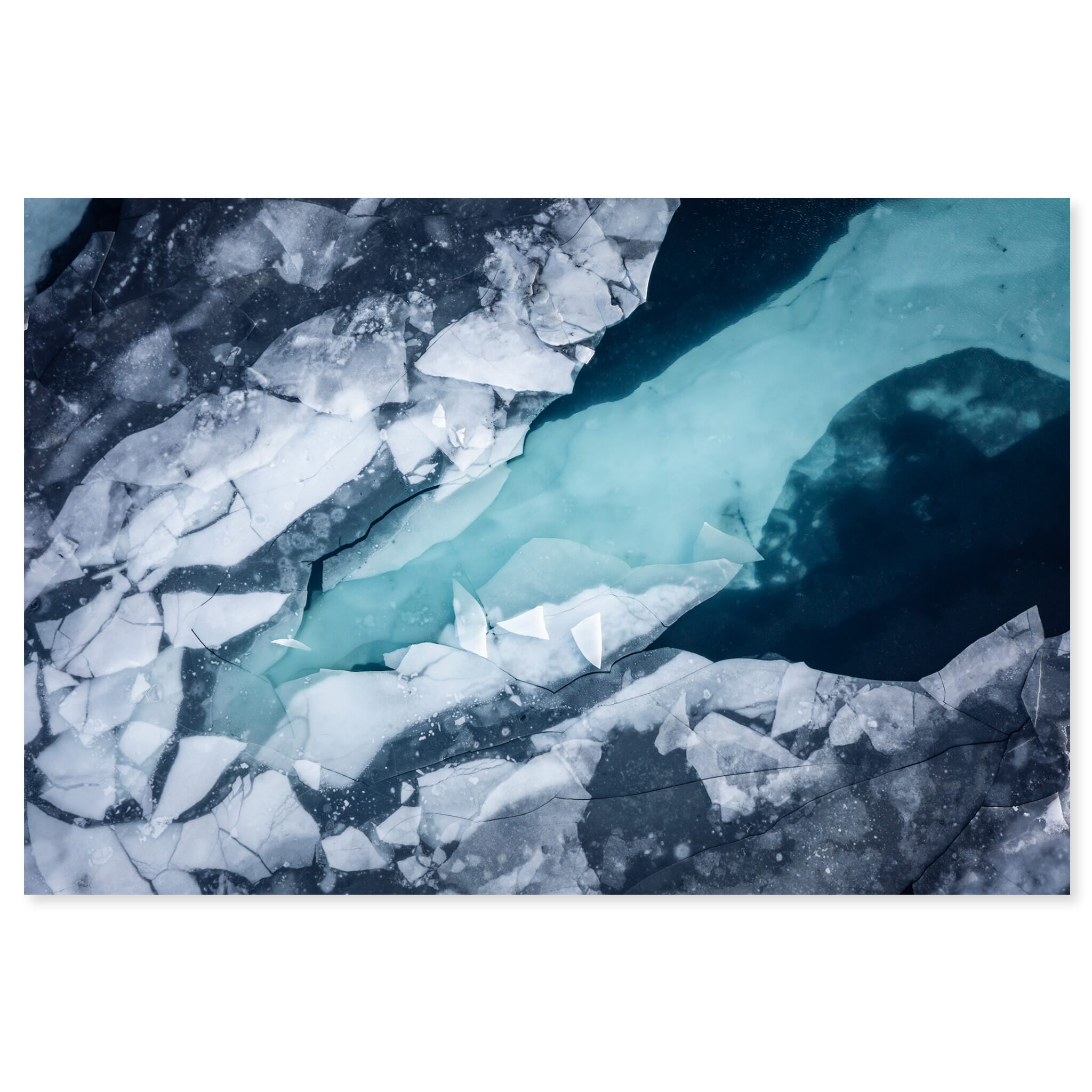 Fine art print of aerial view of fractured ice and floating fragments in Iceland