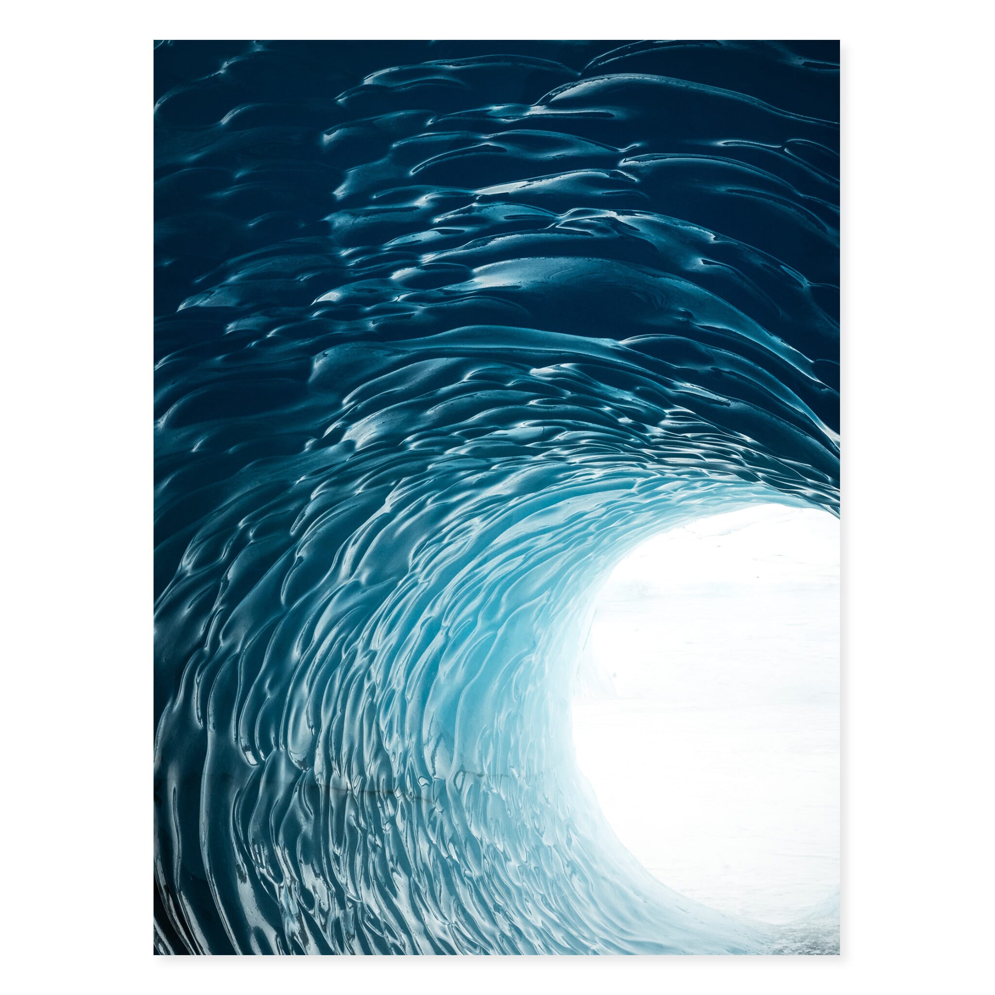 Framed photo print of vivid blue iceberg tunnels in an Icelandic lagoon