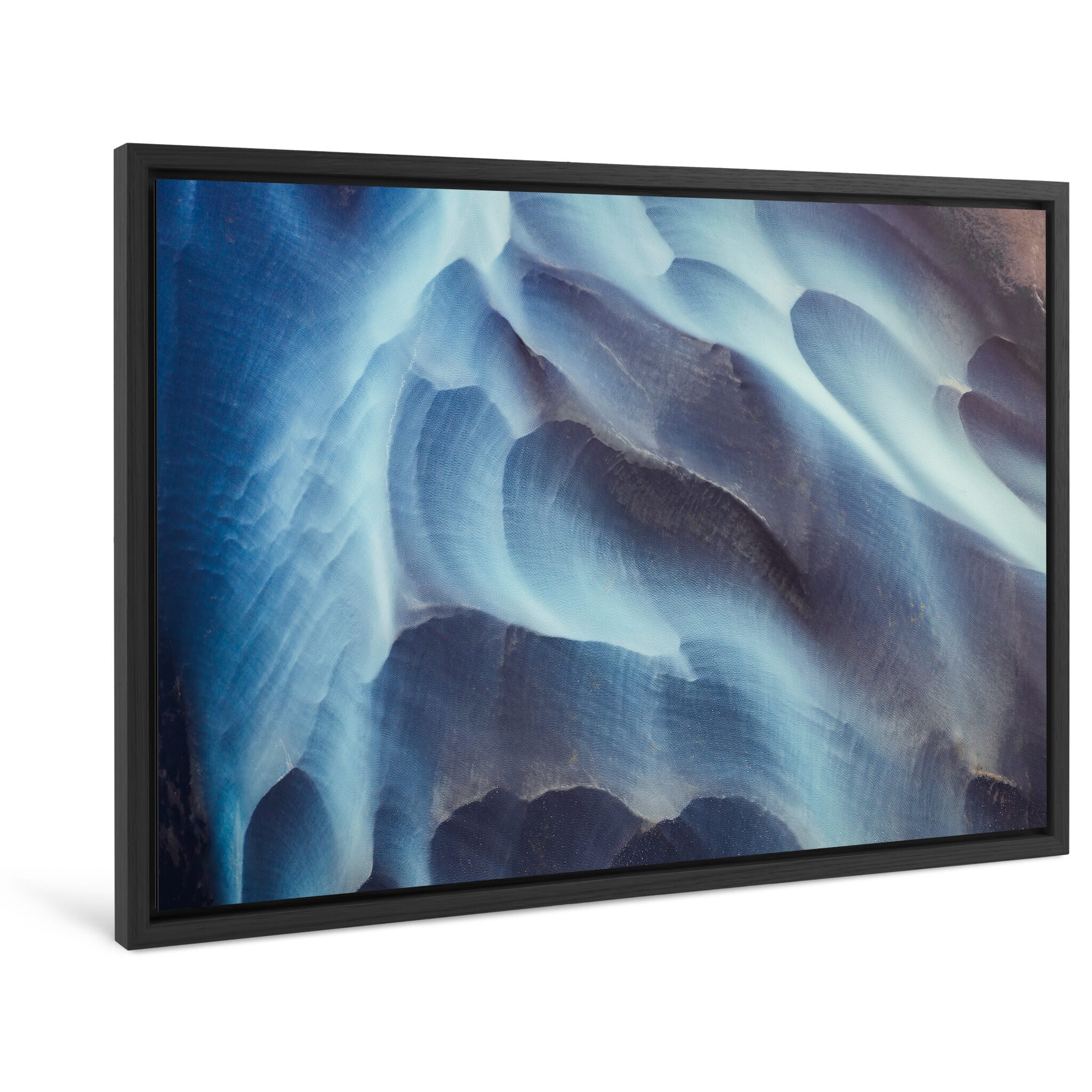 Framed photo print of braided glacial waterways with flowing blue channels