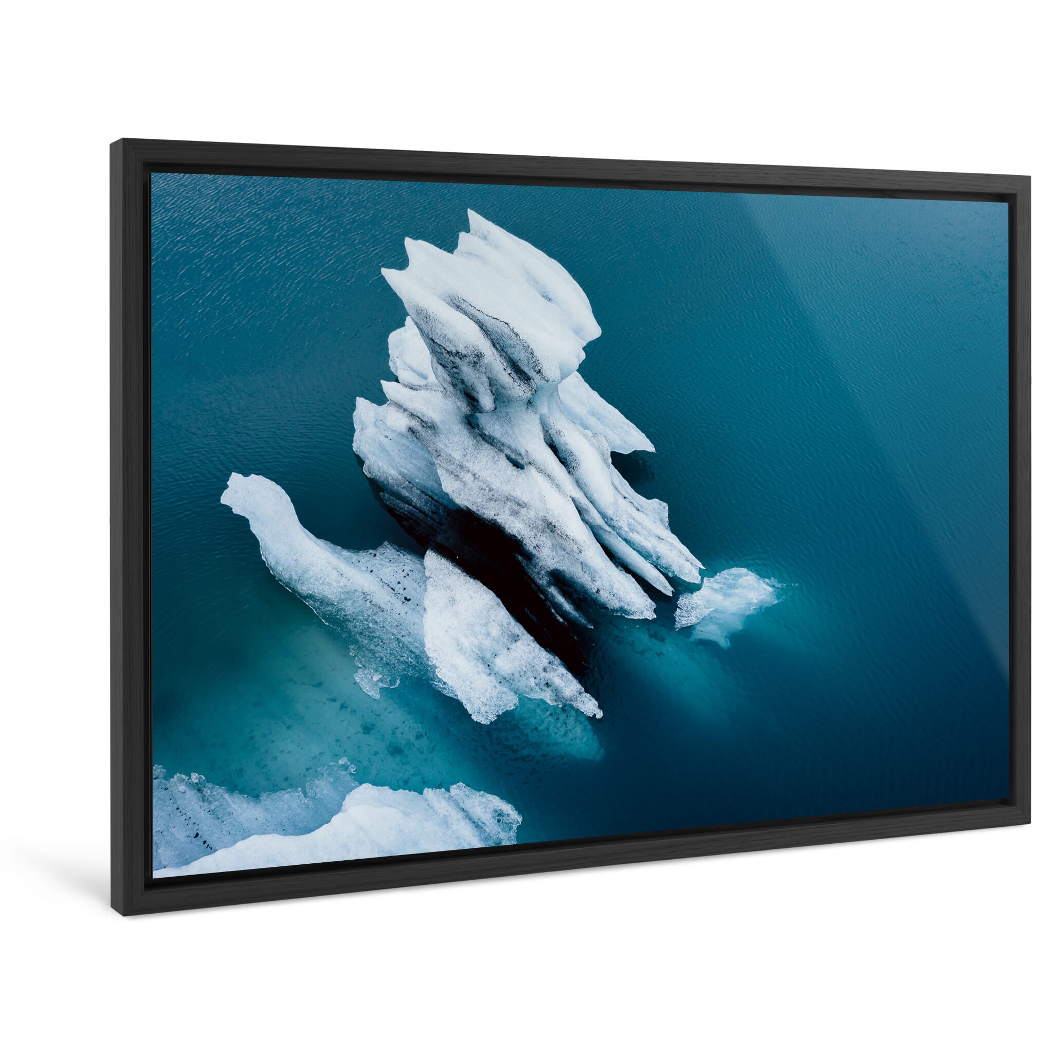 Framed photo print of sculptural ice forms with dark volcanic ash layers