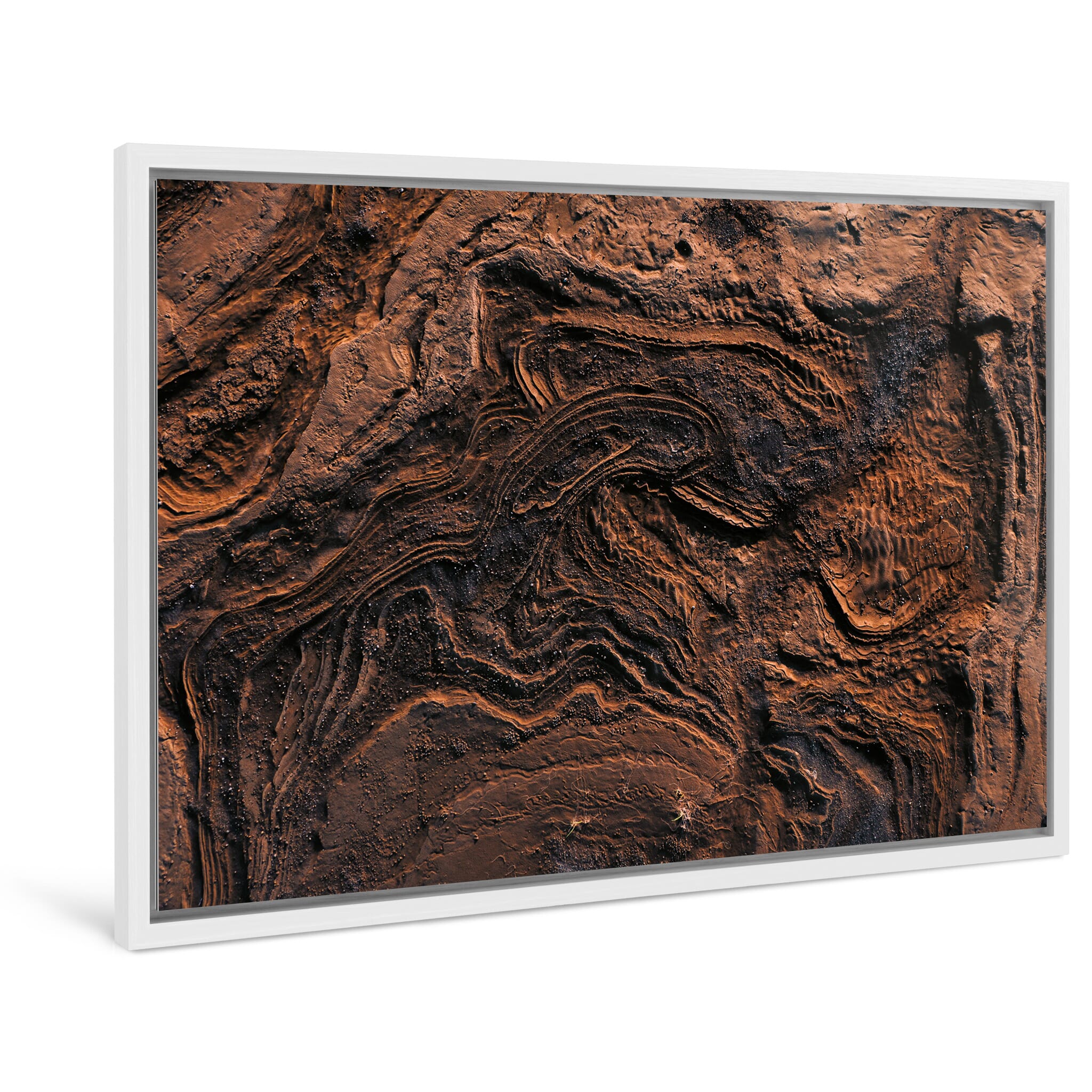Framed photo print of Icelandic landscape marked by meltwater flow and organic structures