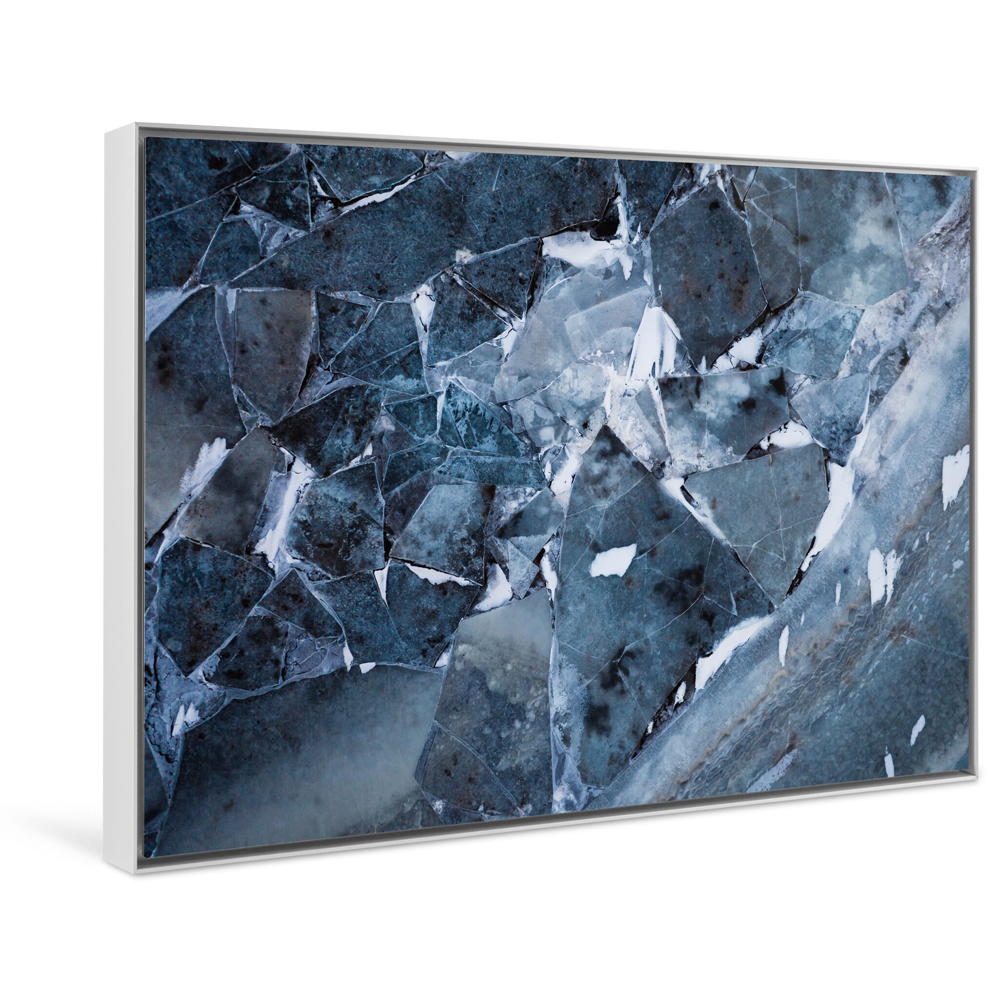 Framed photo print of textured river ice with contrasting colors from minerals and ash