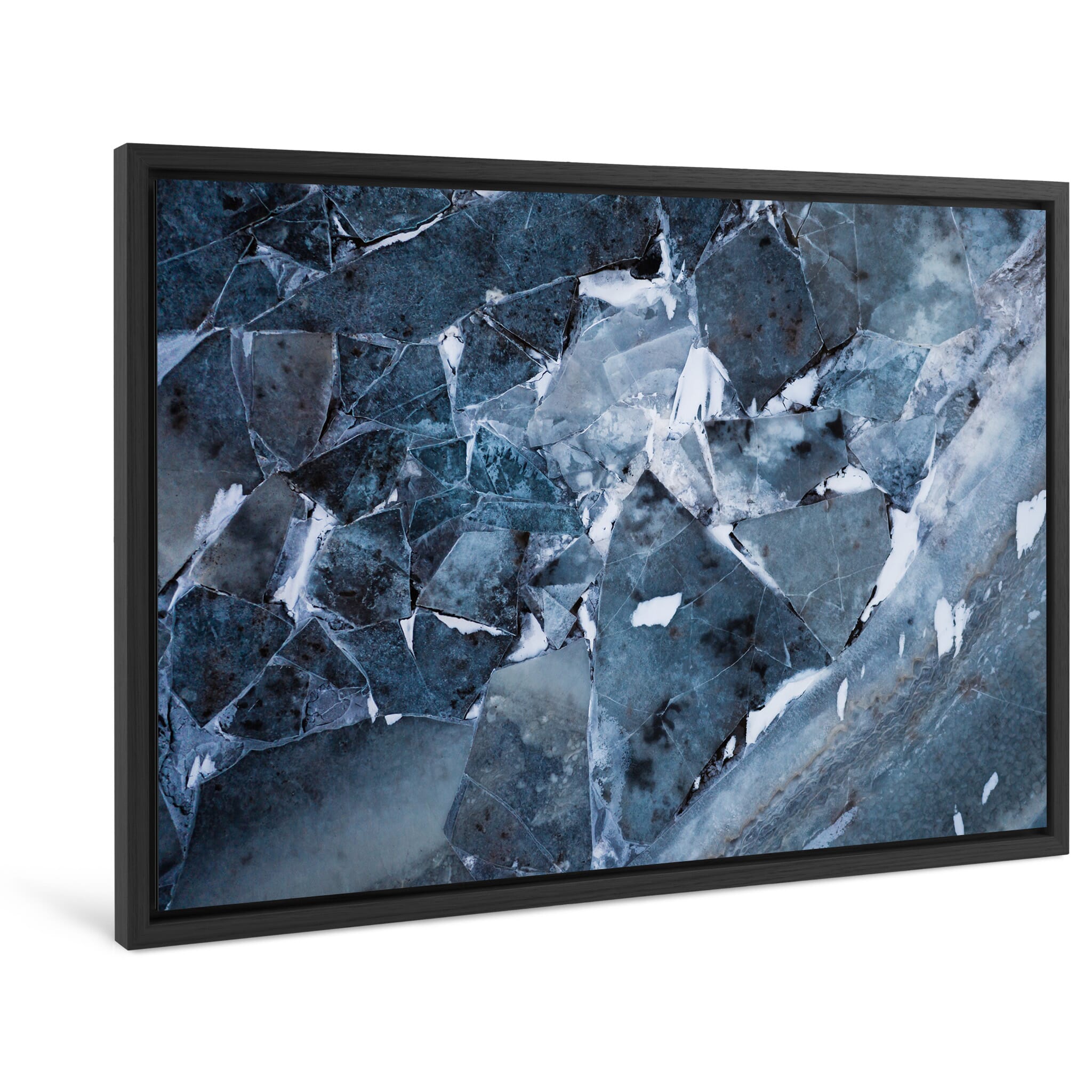 Framed photo print of layered winter ice featuring tones of black, blue, and brown